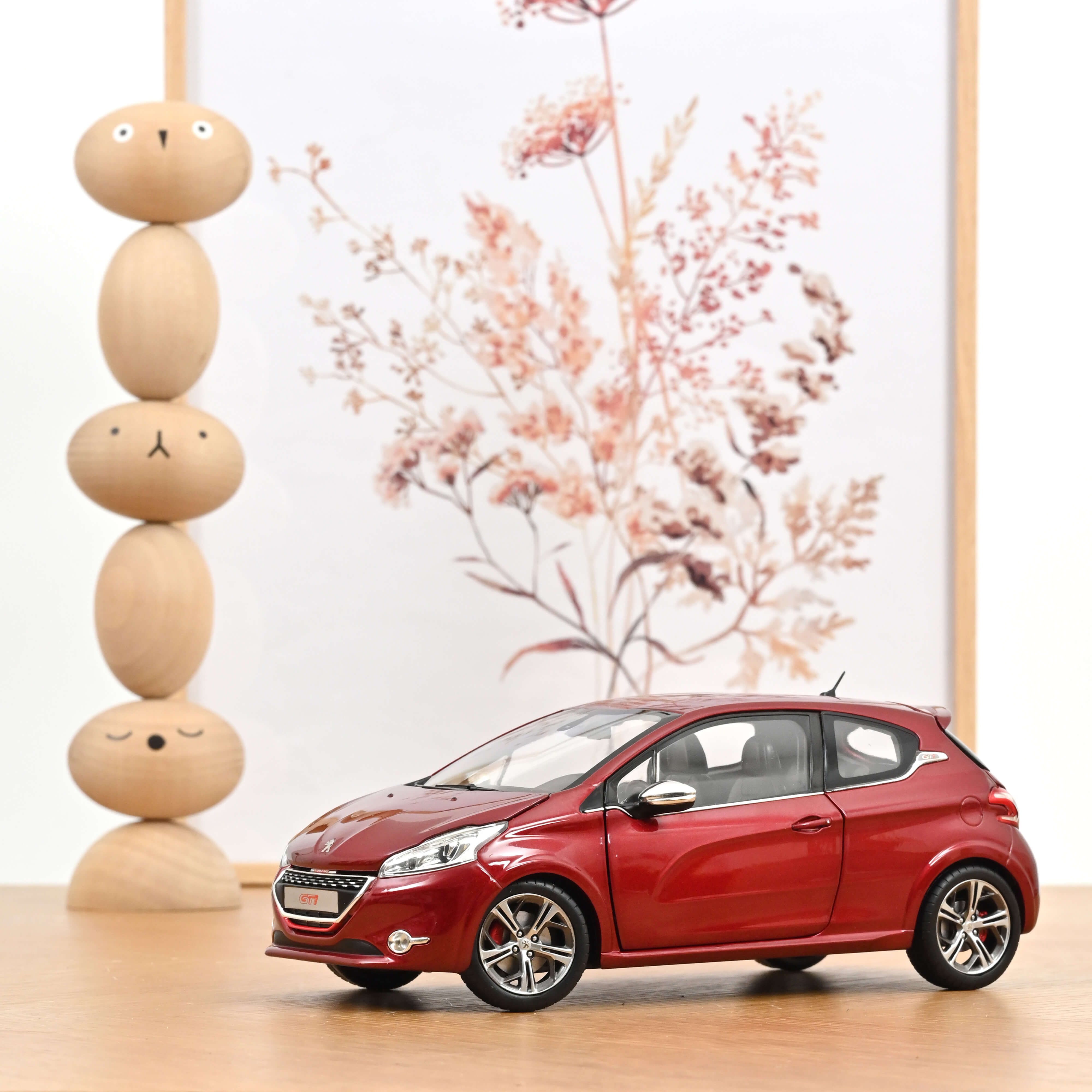 norev-peugeot-208-gti-2013-rouge-rubis-1-18-modellino-novit image 1