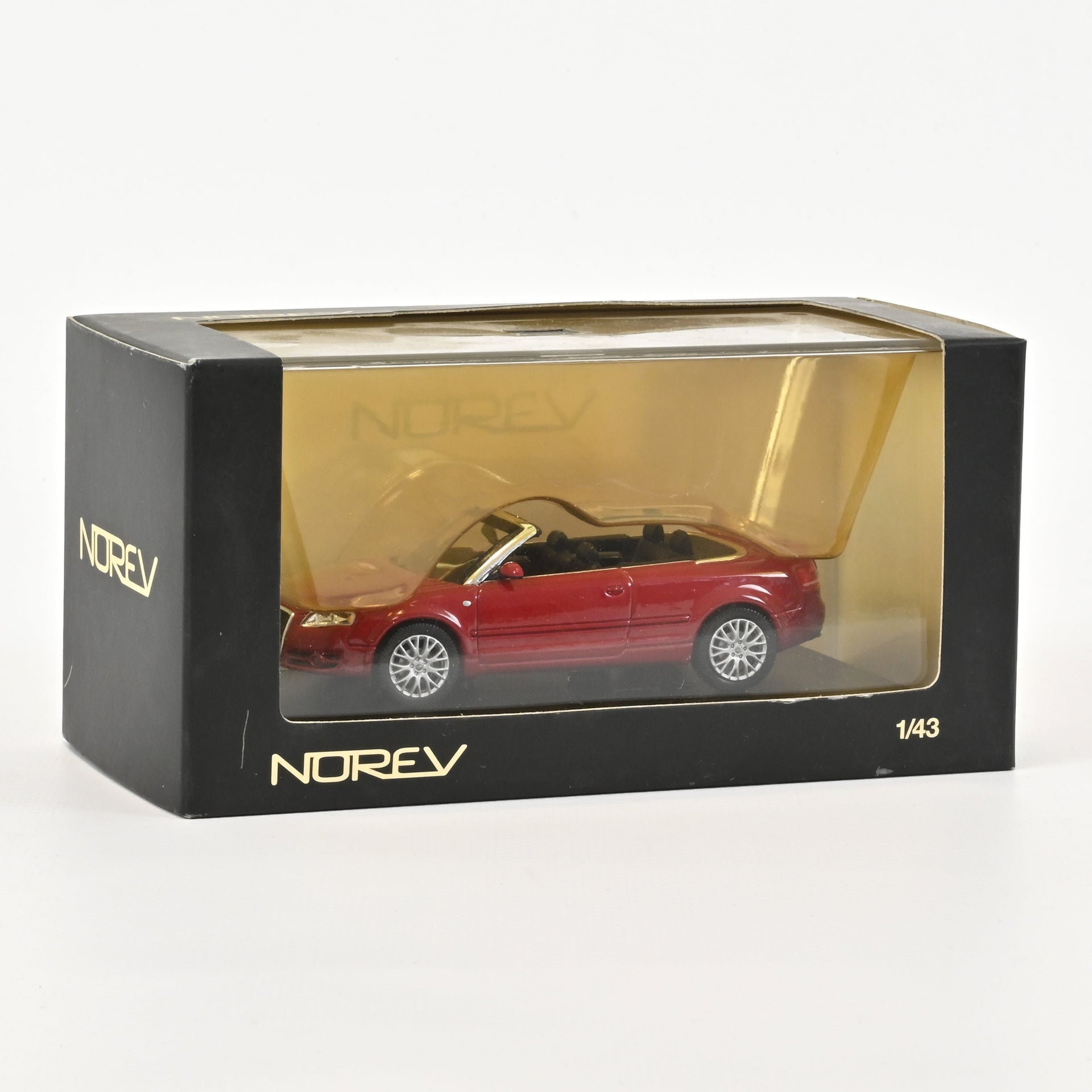norev-audi-a4-cabriolet-modellino-auto-1-43-rosso-garnet-metallizzato image 1