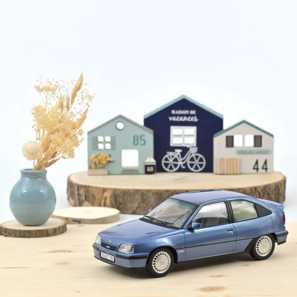 norev-opel-kadett-gsi-1987-bleu-clair-m-tallis-modellino-auto-1-18-edizione-200p image 1