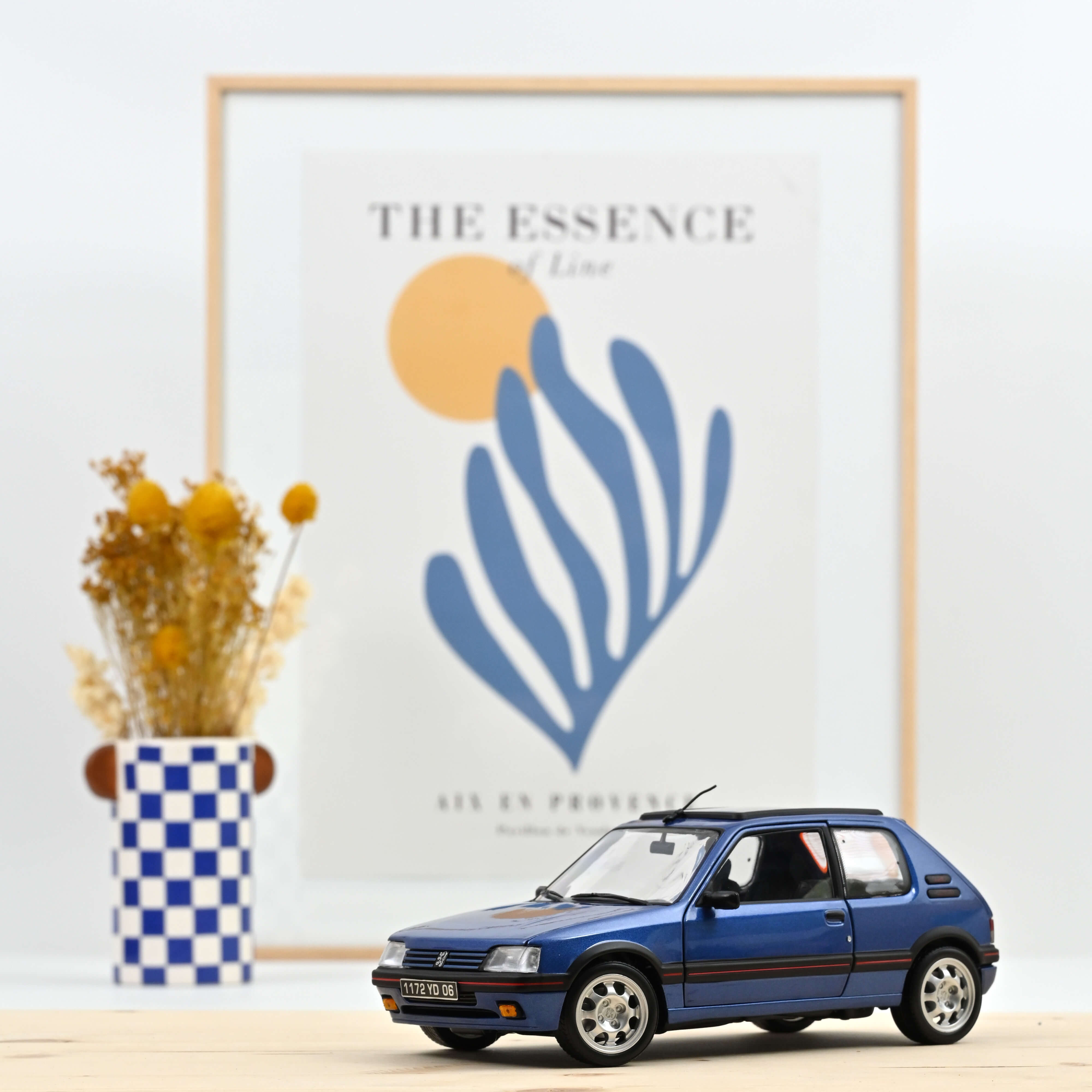 norev-peugeot-205-gti-1-9-1992-auto-in-miniatura-1-18-blu-miami-con-tetto-apribi image 1