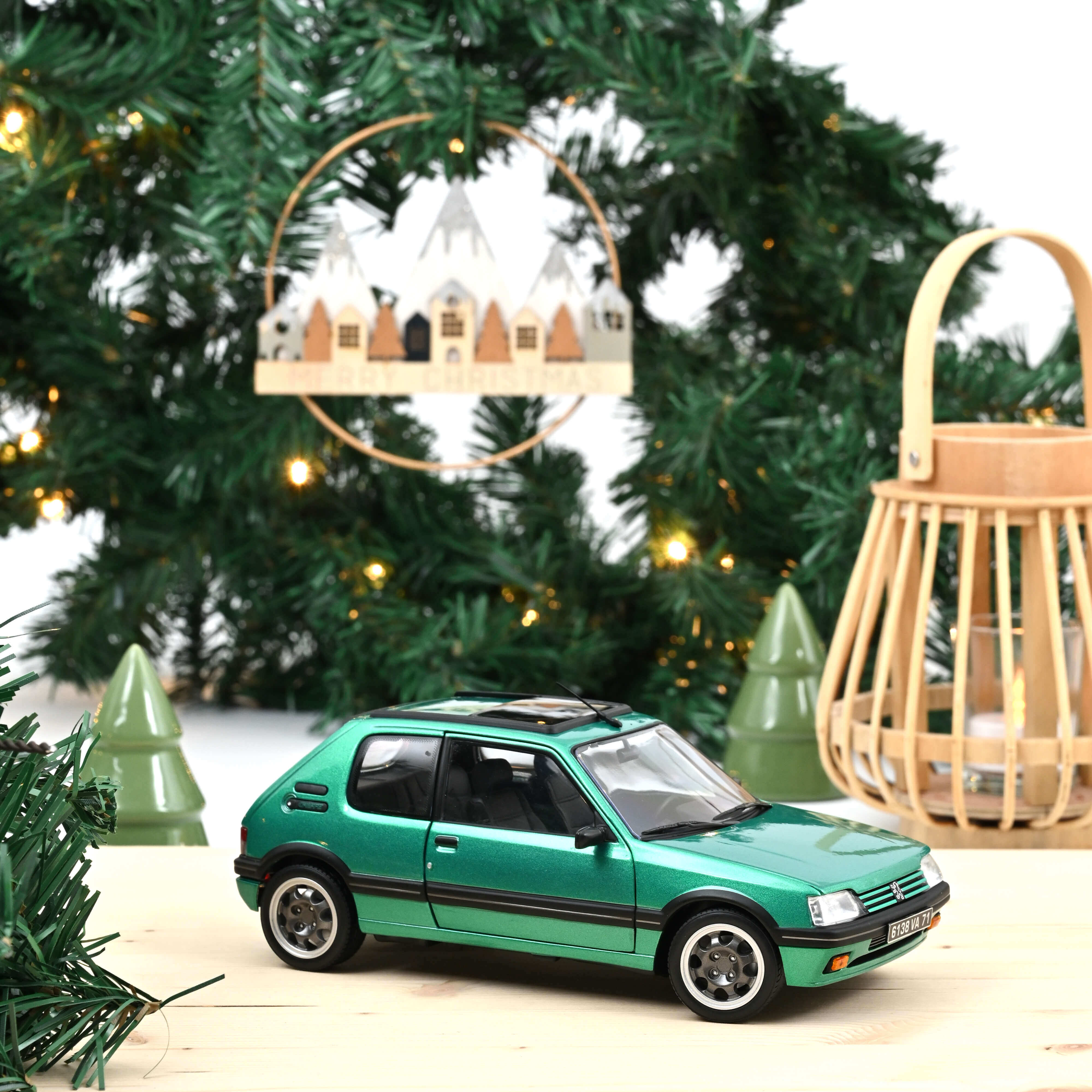 norev-peugeot-205-gti-griffe-1991-modellino-auto-1-18-verde-con-tetto-apribile image 1