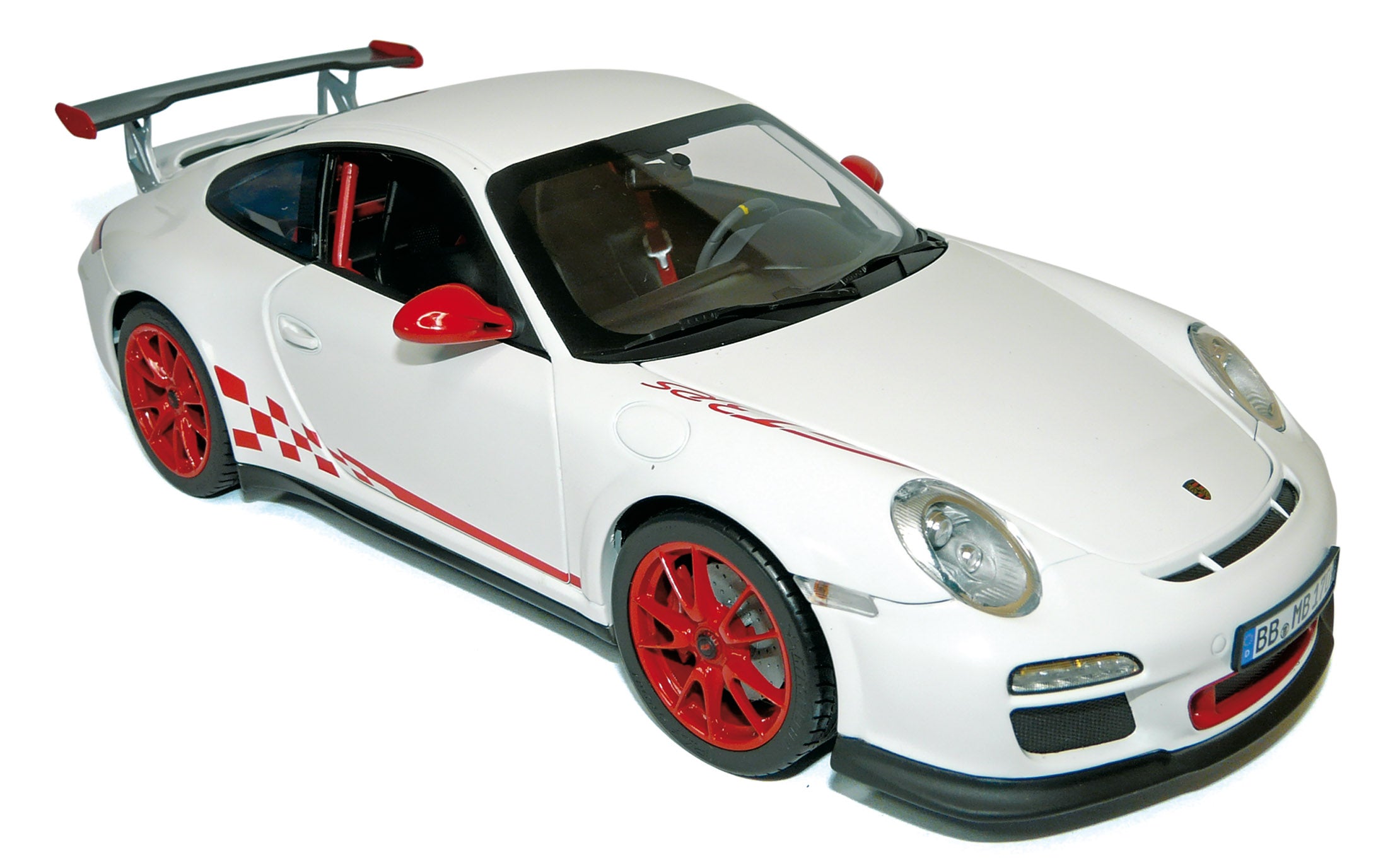 norev-porsche-911-gt3-rs-2010-modellino-auto-1-18-bianca-con-deco-rossa image 1