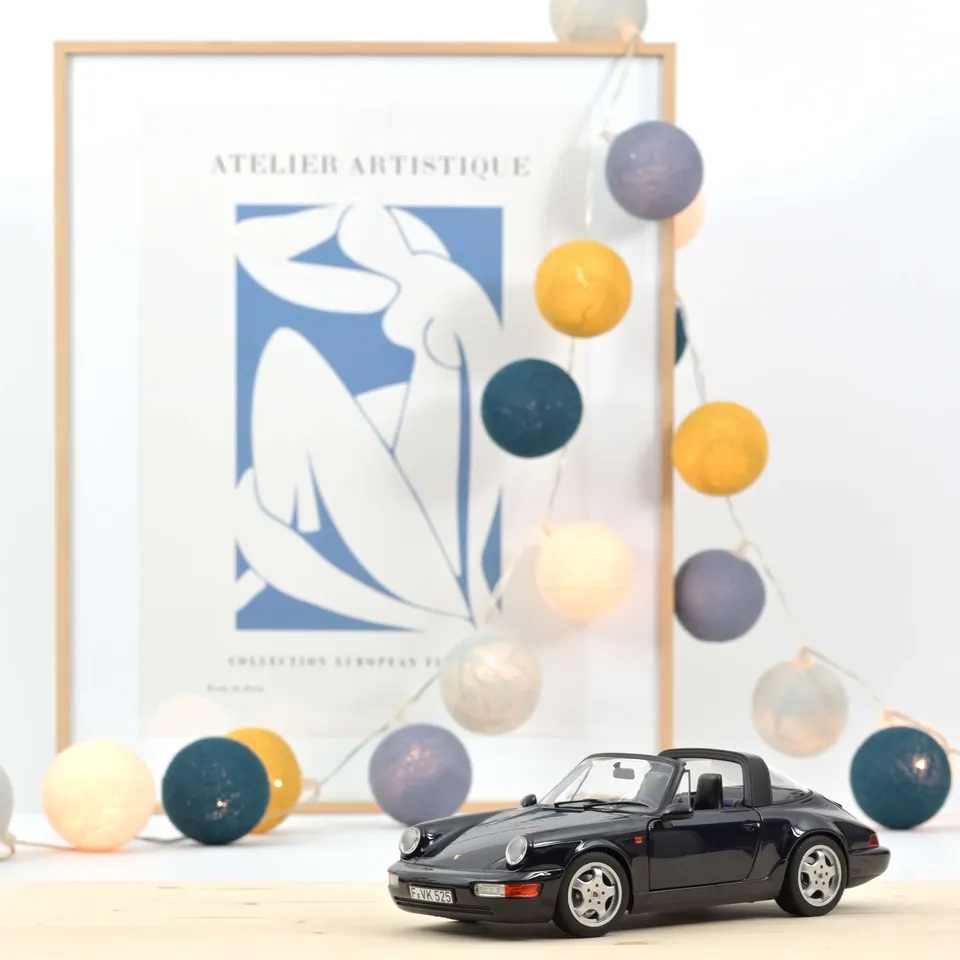 norev-porsche-911-carrera-4-targa-1991-blu-metallizzato-modellino-1-18 image 1