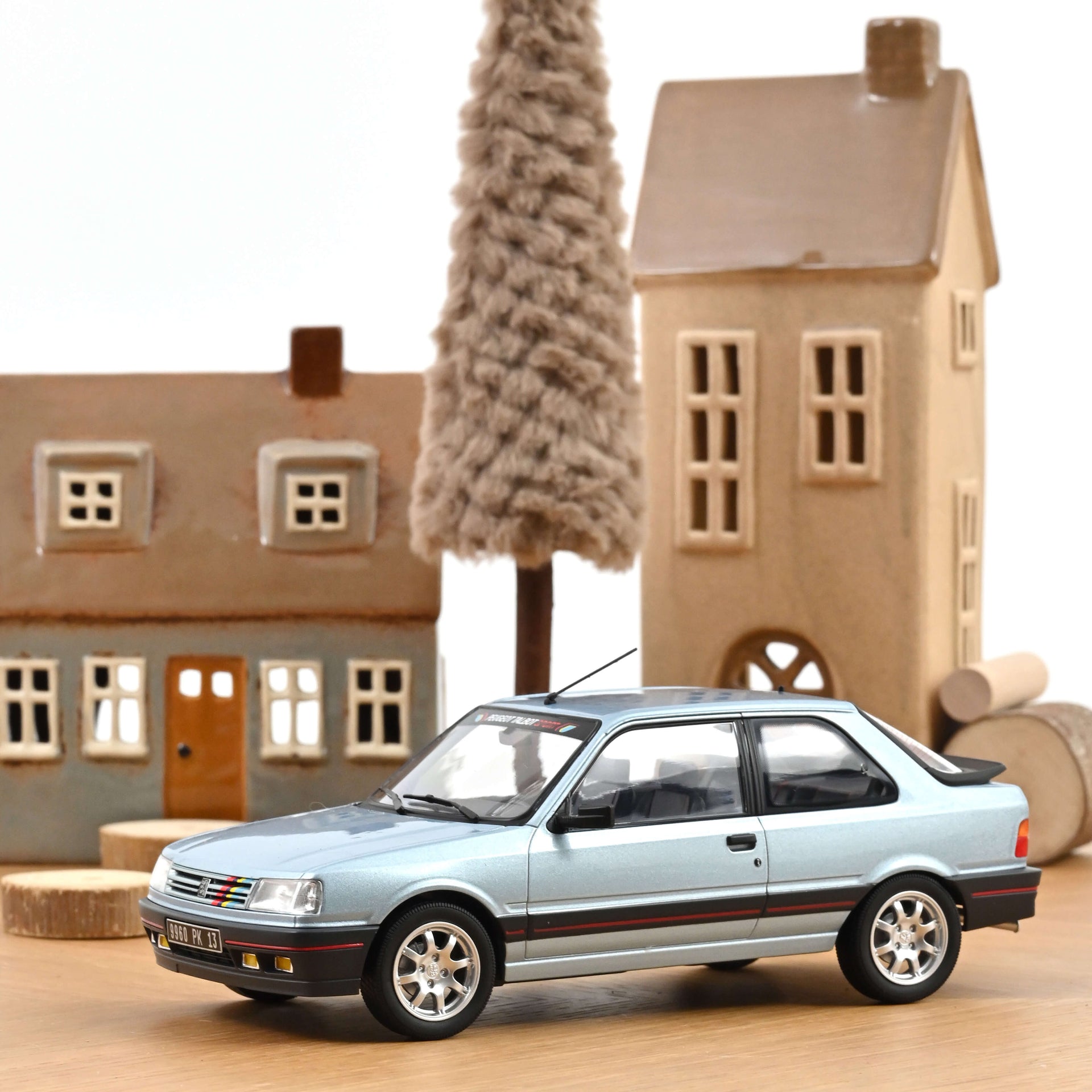 norev-peugeot-309-gti-1988-modellino-1-18-blu-topaze-300-pz image 1