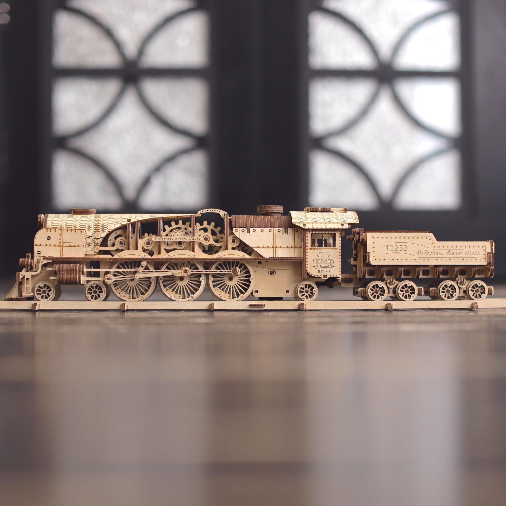 ugears-v-express-steam-train-with-tender-treno-a-vapore-meccanico-in-legno image 8