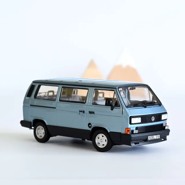 norev-vw-multivan-1990-light-blue-metallic-modellino-furgone-1-18 image 1