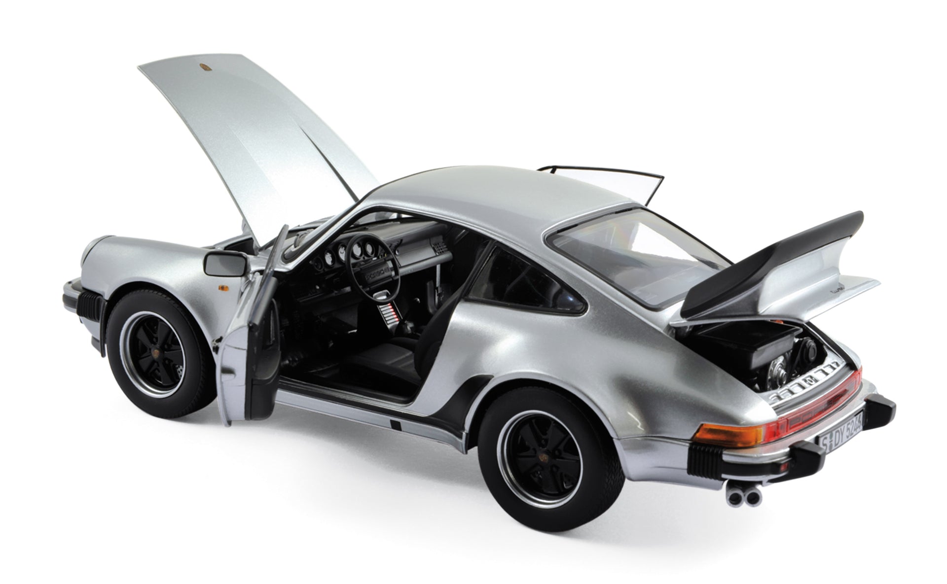 norev-porsche-911-turbo-3-3l-1977-argento-modellino-1-18 image 1