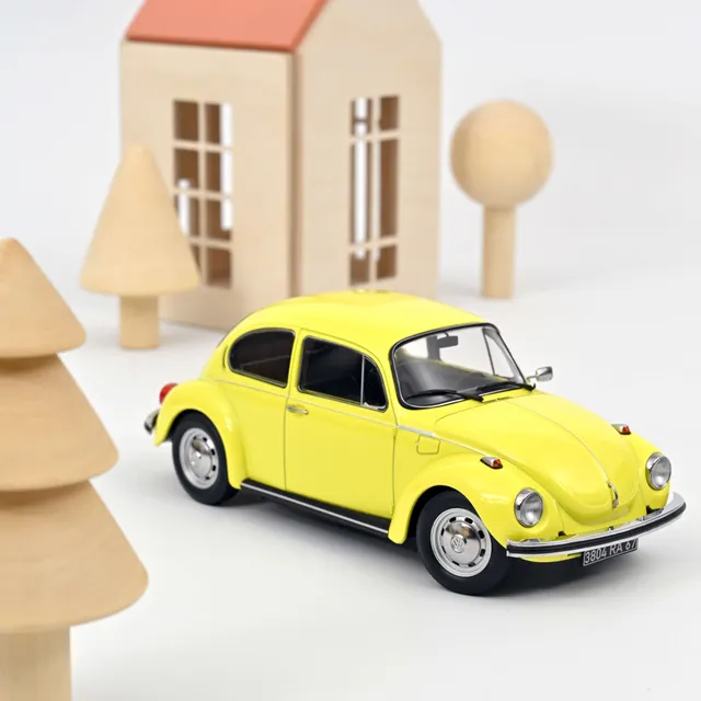 norev-vw-1303-maggiolone-1973-giallo-1-18-edizione-200-pezzi image 1