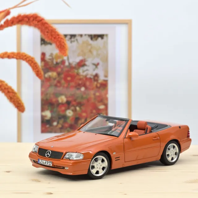 norev-mercedes-benz-sl-500-1999-arancione-metallizzato-1-18-200-pz image 1