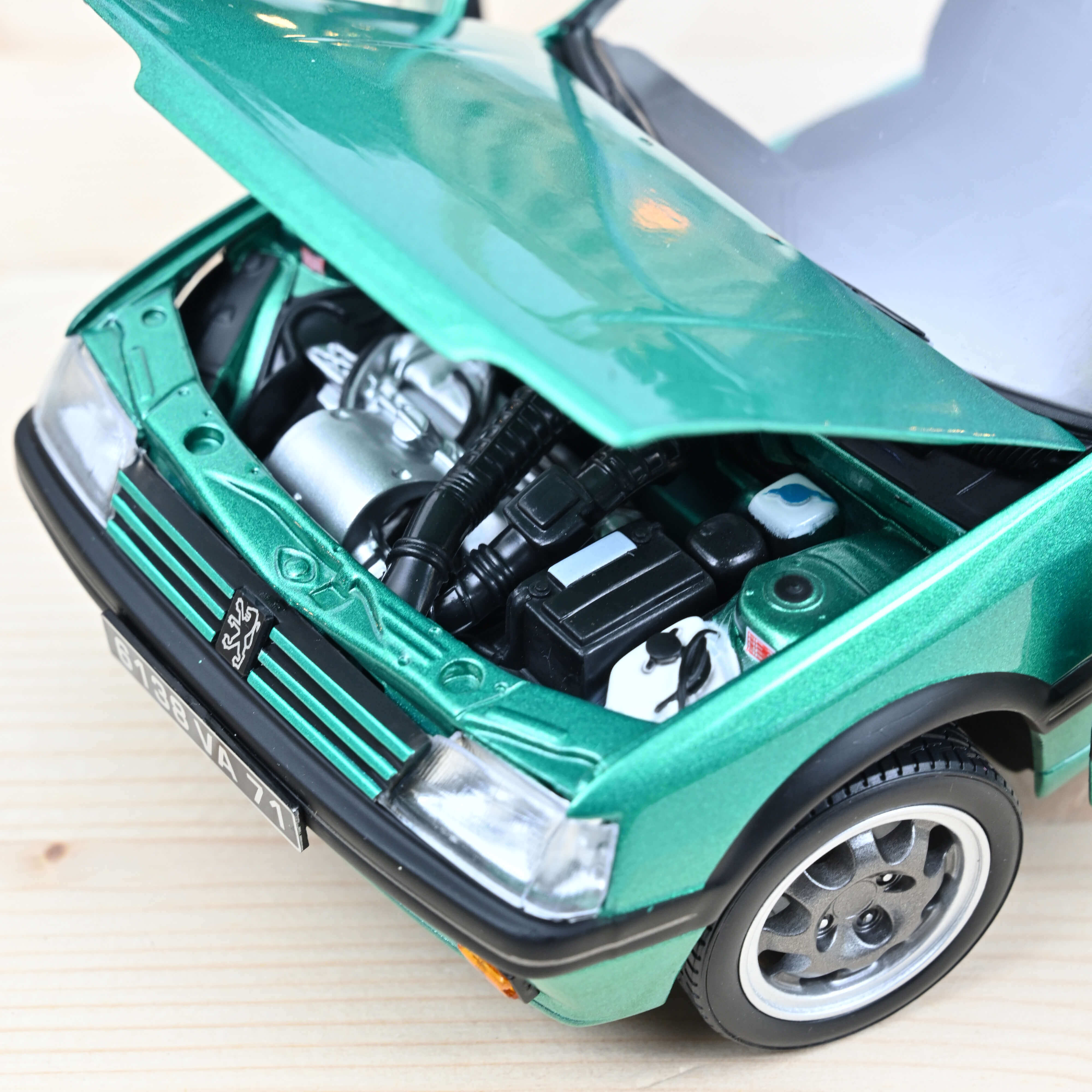 norev-peugeot-205-gti-griffe-1991-modellino-auto-1-18-verde-con-tetto-apribile image 3