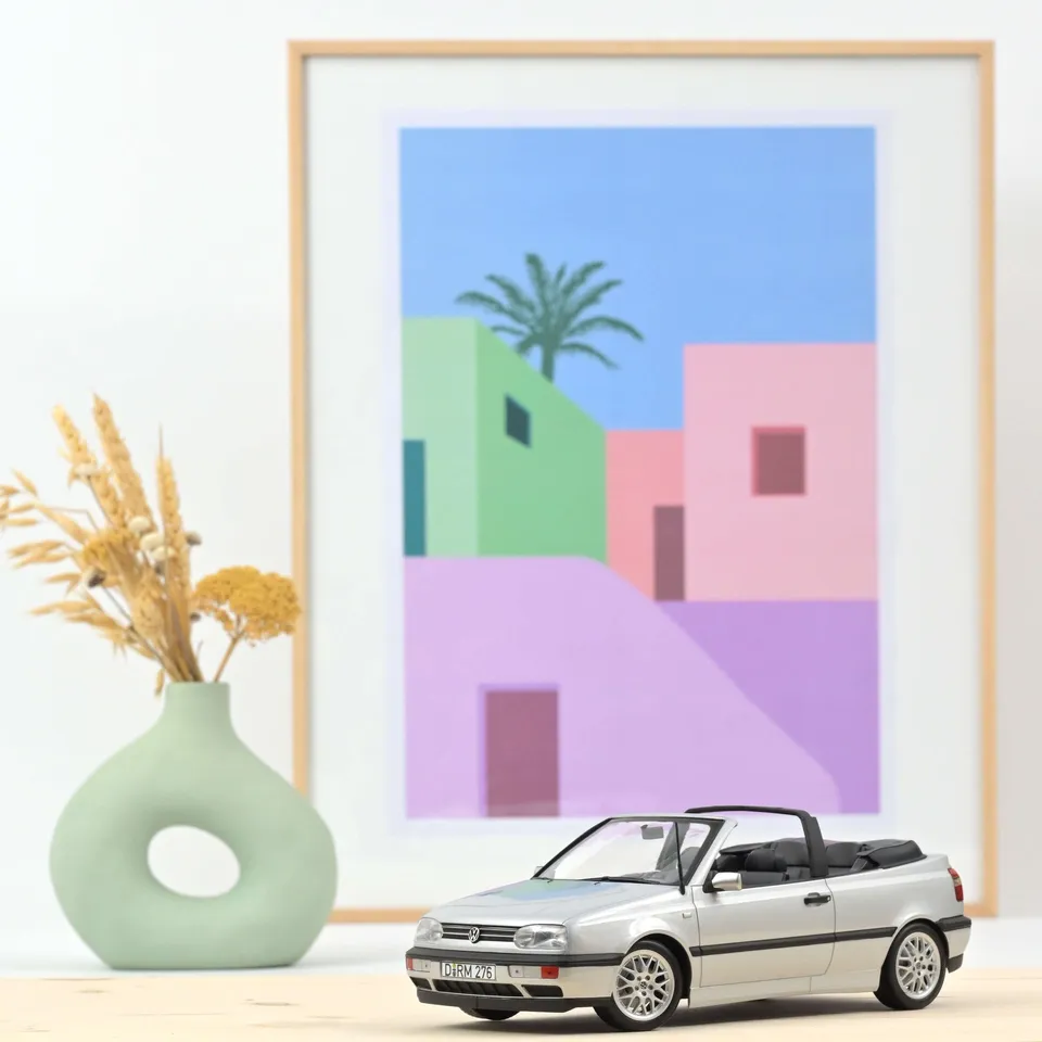 norev-vw-golf-cabriolet-1995-argento-modellino-auto-1-18 image 1