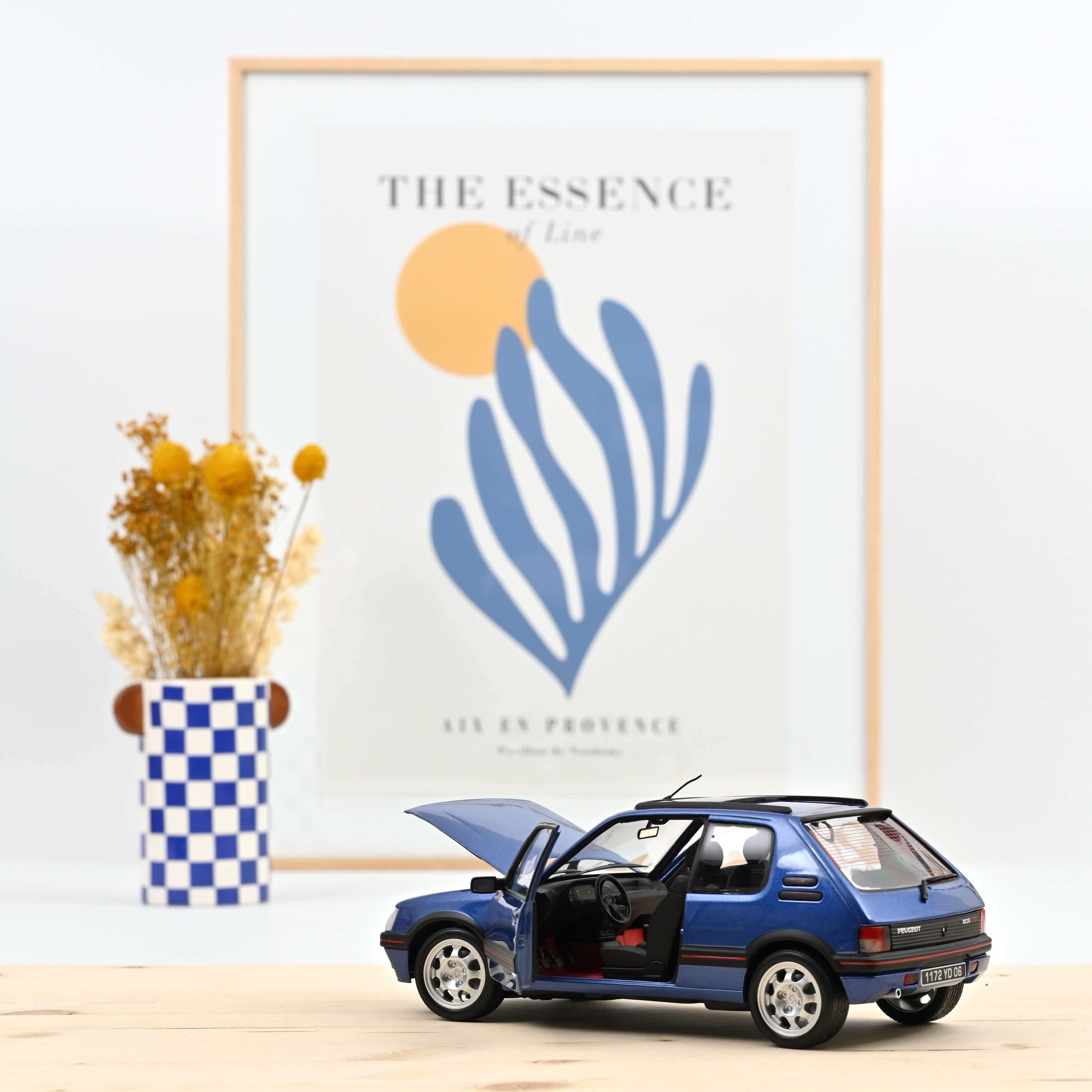 norev-peugeot-205-gti-1-9-1992-auto-in-miniatura-1-18-blu-miami-con-tetto-apribi image 2