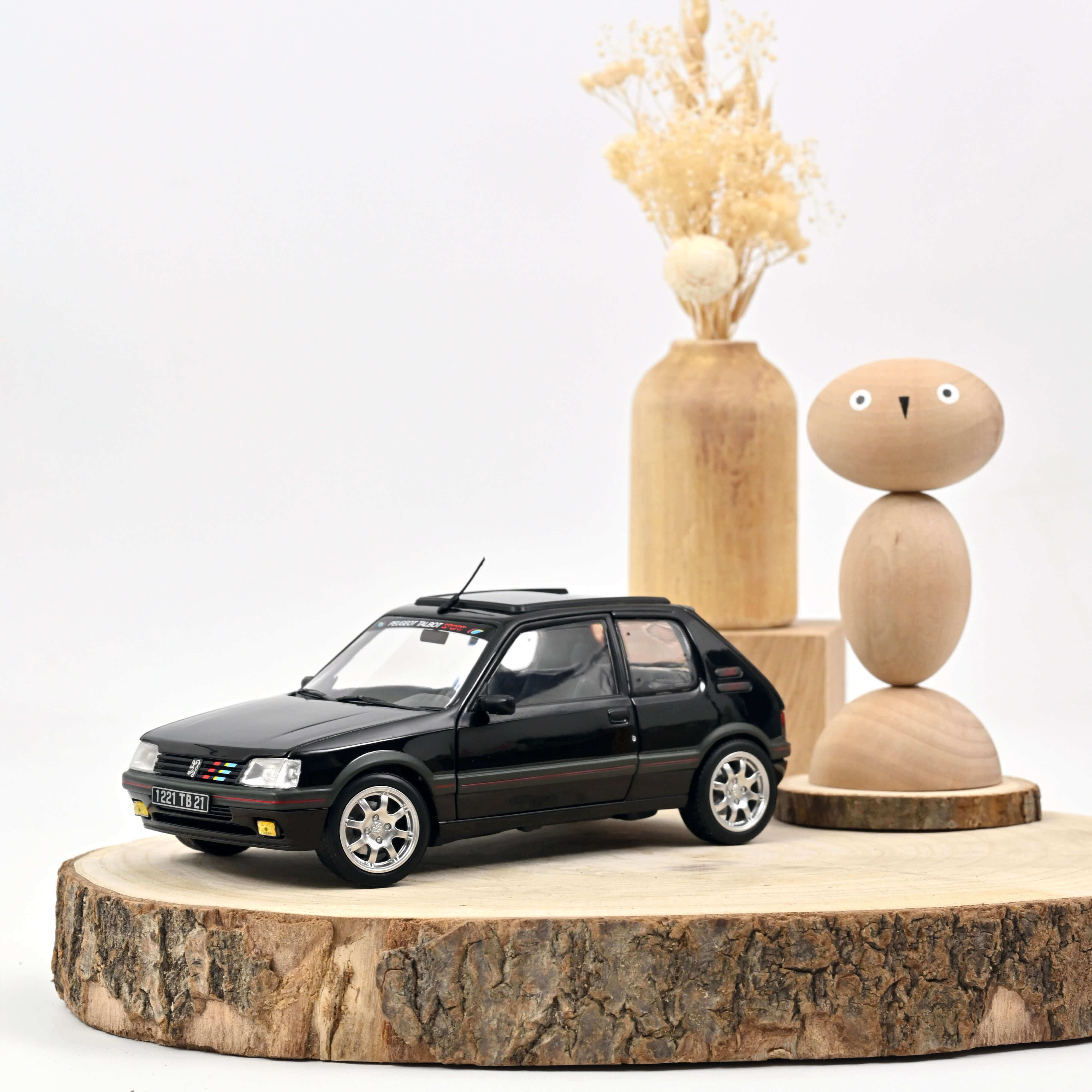 norev-peugeot-205-gti-1-9-1990-modellino-auto-1-18-nero-pts-205-pz image 1