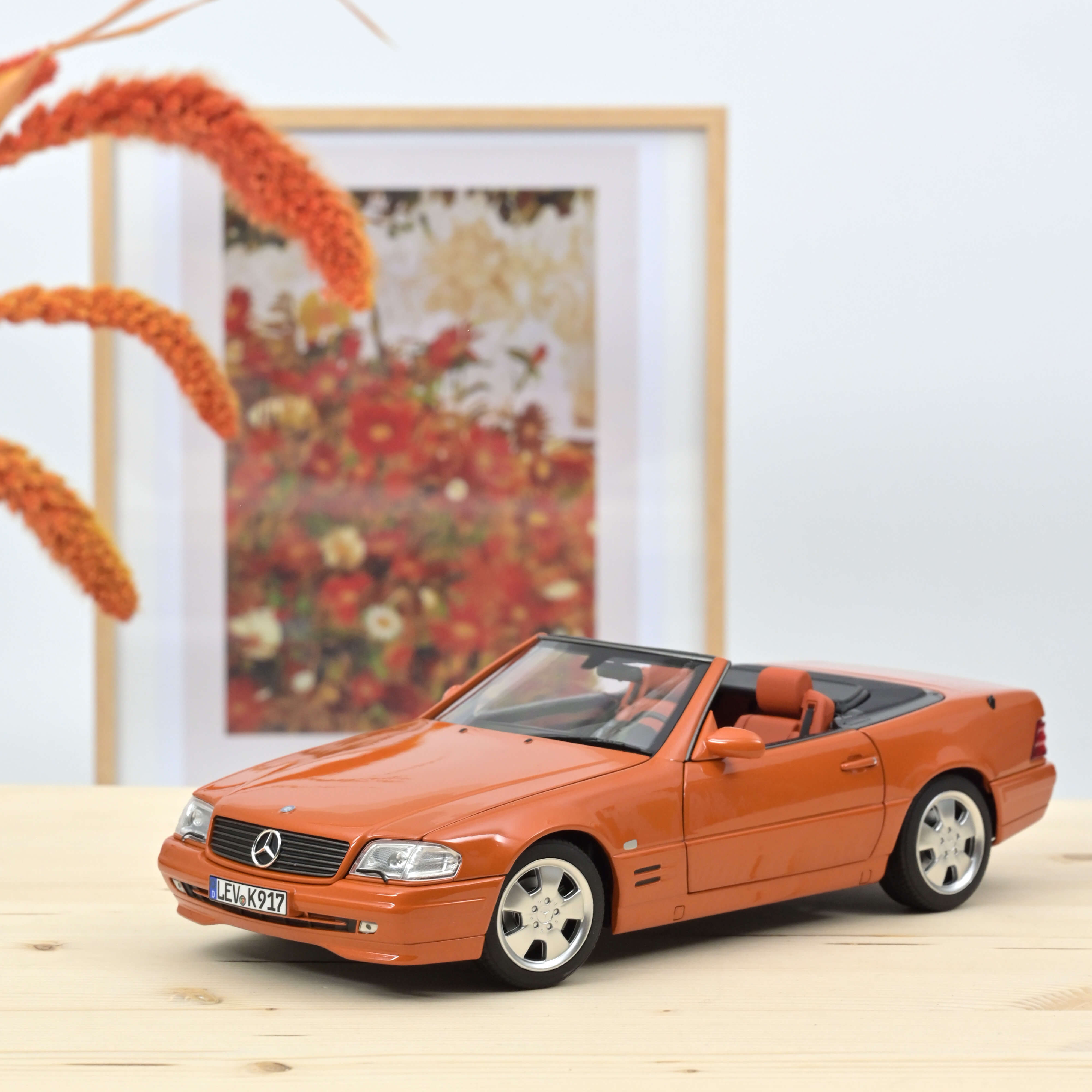 norev-mercedes-benz-sl-500-1999-arancione-metallizzato-1-18-200-pz-web-excl image 1