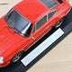 norev-porsche-911-rs-1973-arancione-nero-modellino-auto-1-18-300-pz image 3