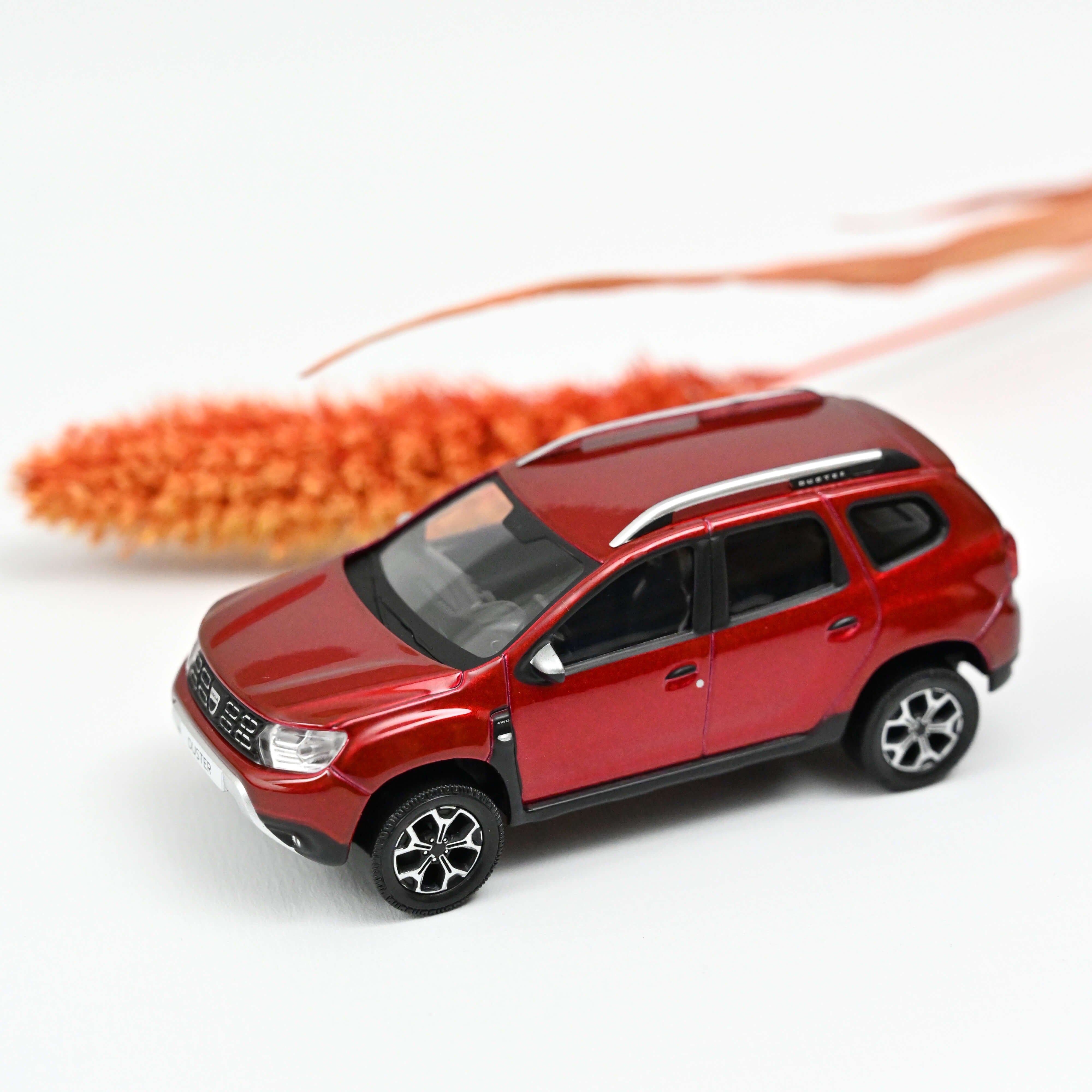 norev-dacia-duster-2018-1-43-rouge-flamme-modellino-die-cast-suv image 1