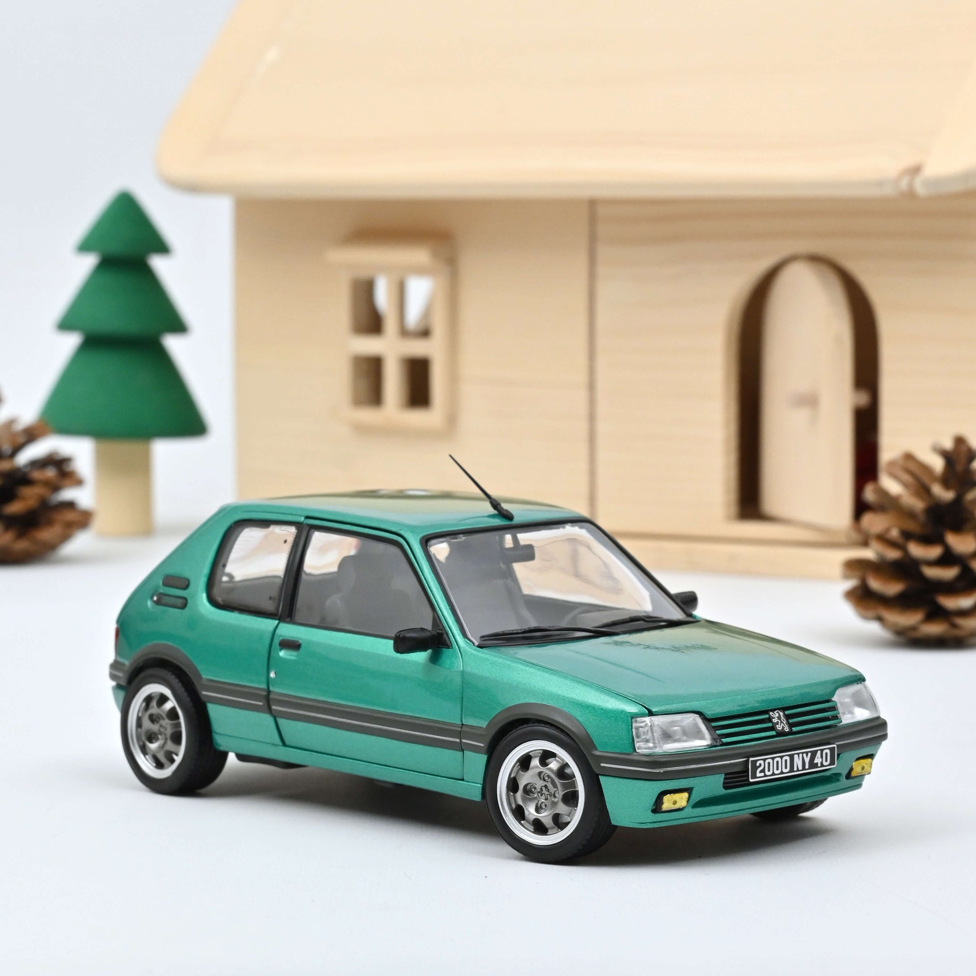 norev-peugeot-205-gti-griffe-1990-auto-in-miniatura-1-18-verde image 1