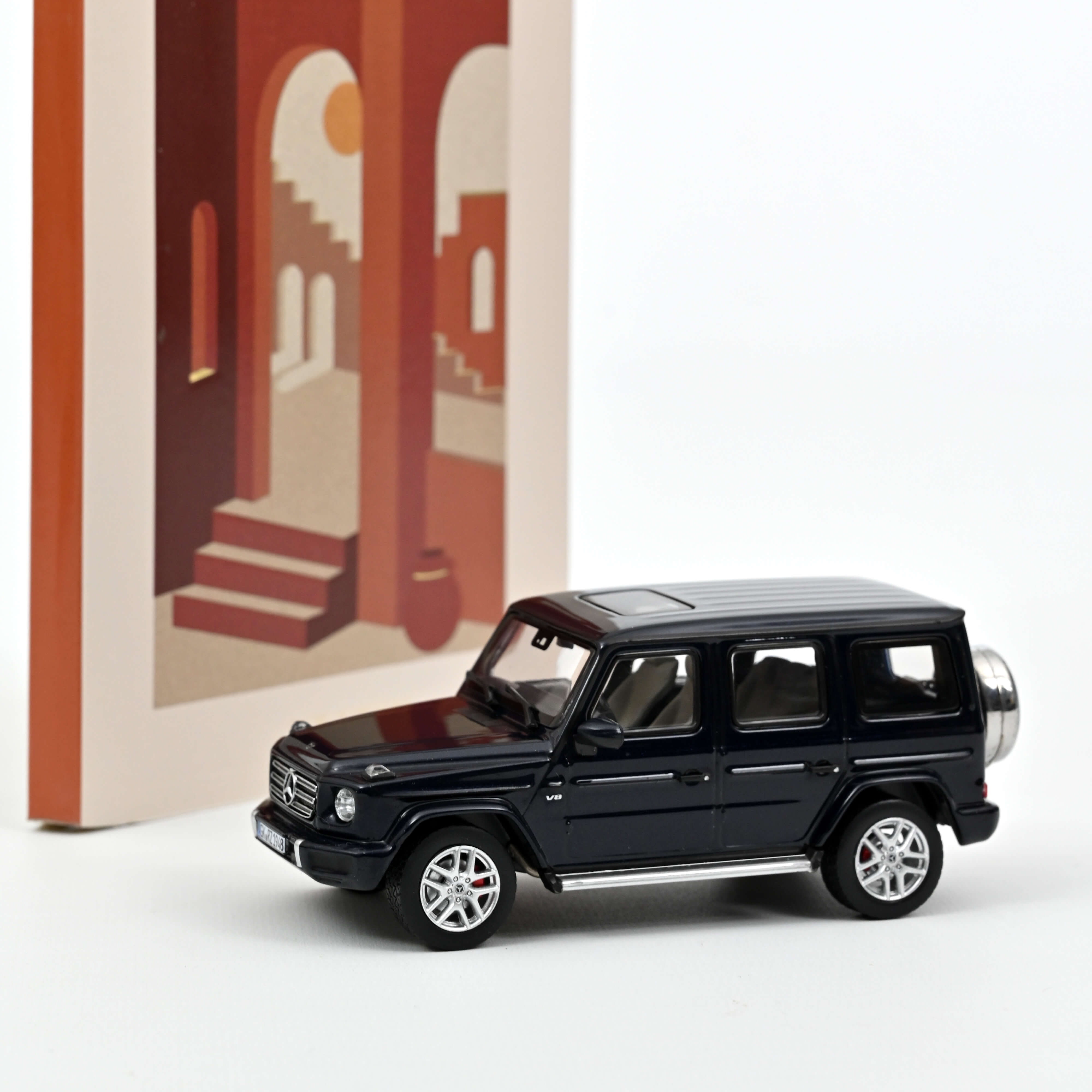 norev-mercedes-benz-classe-g-2018-modellino-1-43-blu-scuro-metallizzato image 1
