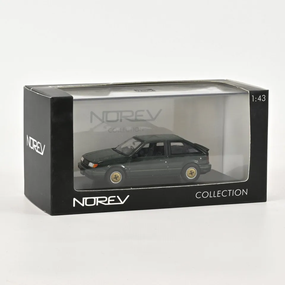 norev-isuzu-gemini-zz-1600-dohc-handling-by-lotus-1988-modellino-auto-1-43-verde image 1