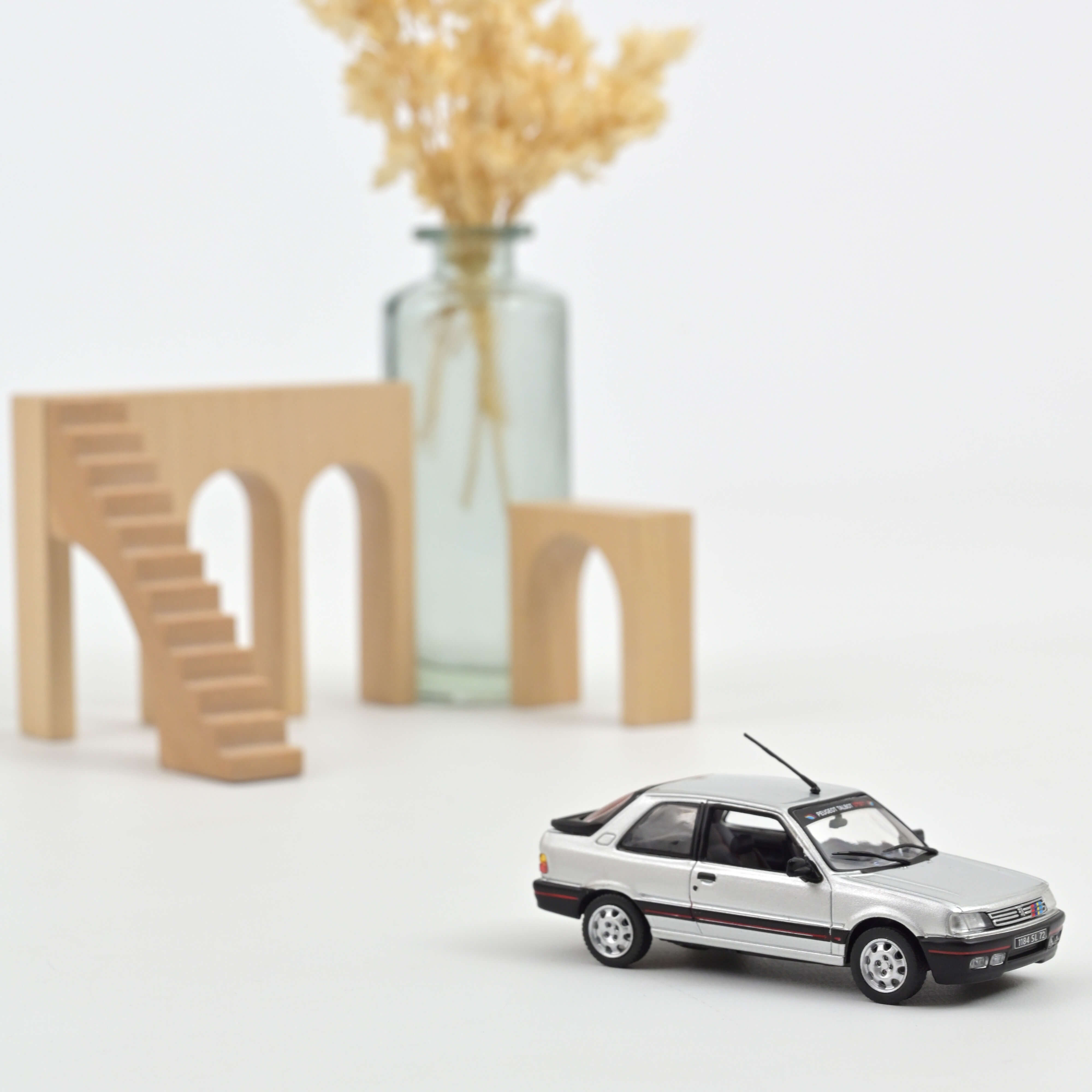 norev-peugeot-309-gti-1987-grigio-futura-pts-modellino-1-43 image 1