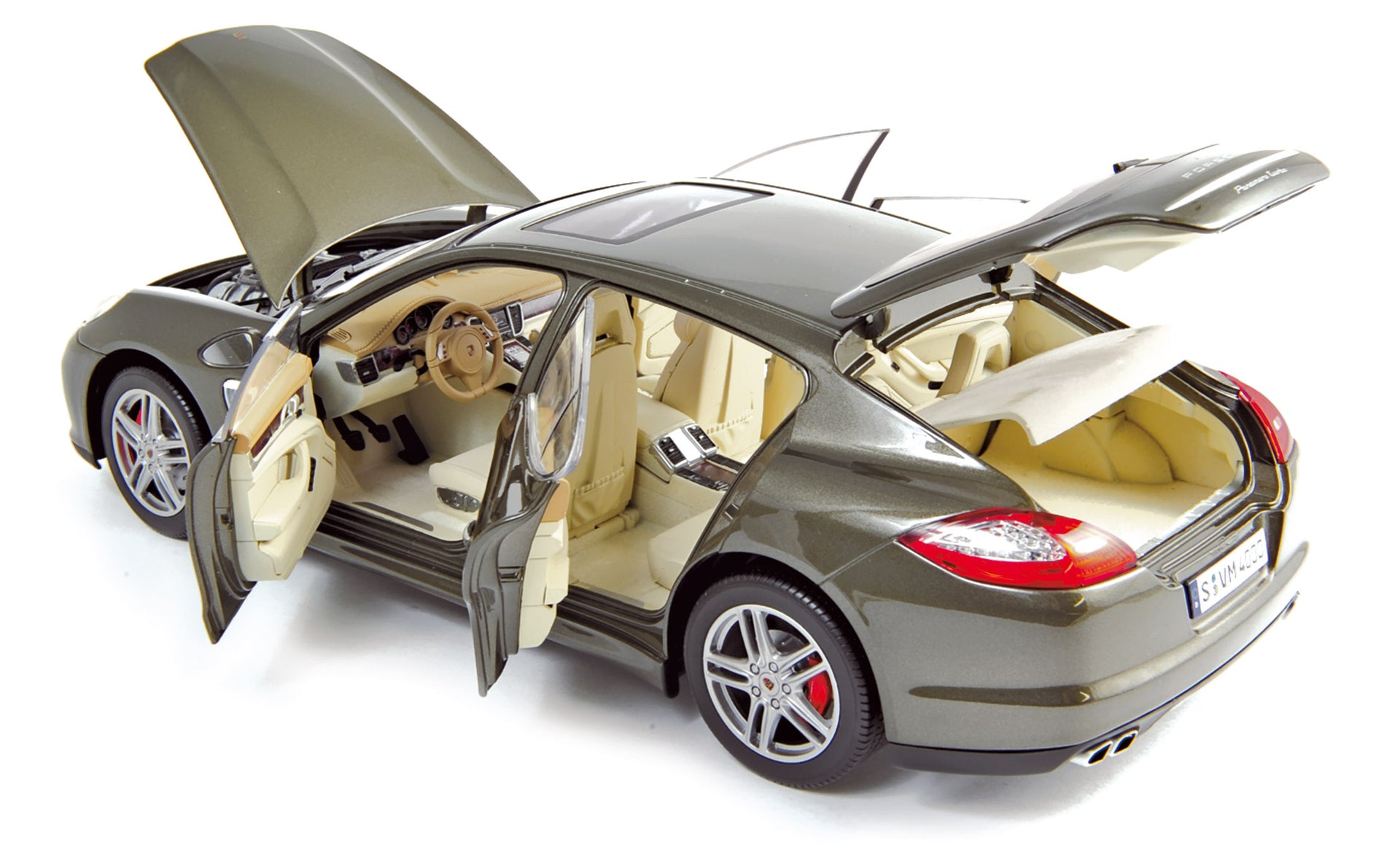 norev-porsche-panamera-turbo-2009-modellino-auto-1-18-topasbrown image 1