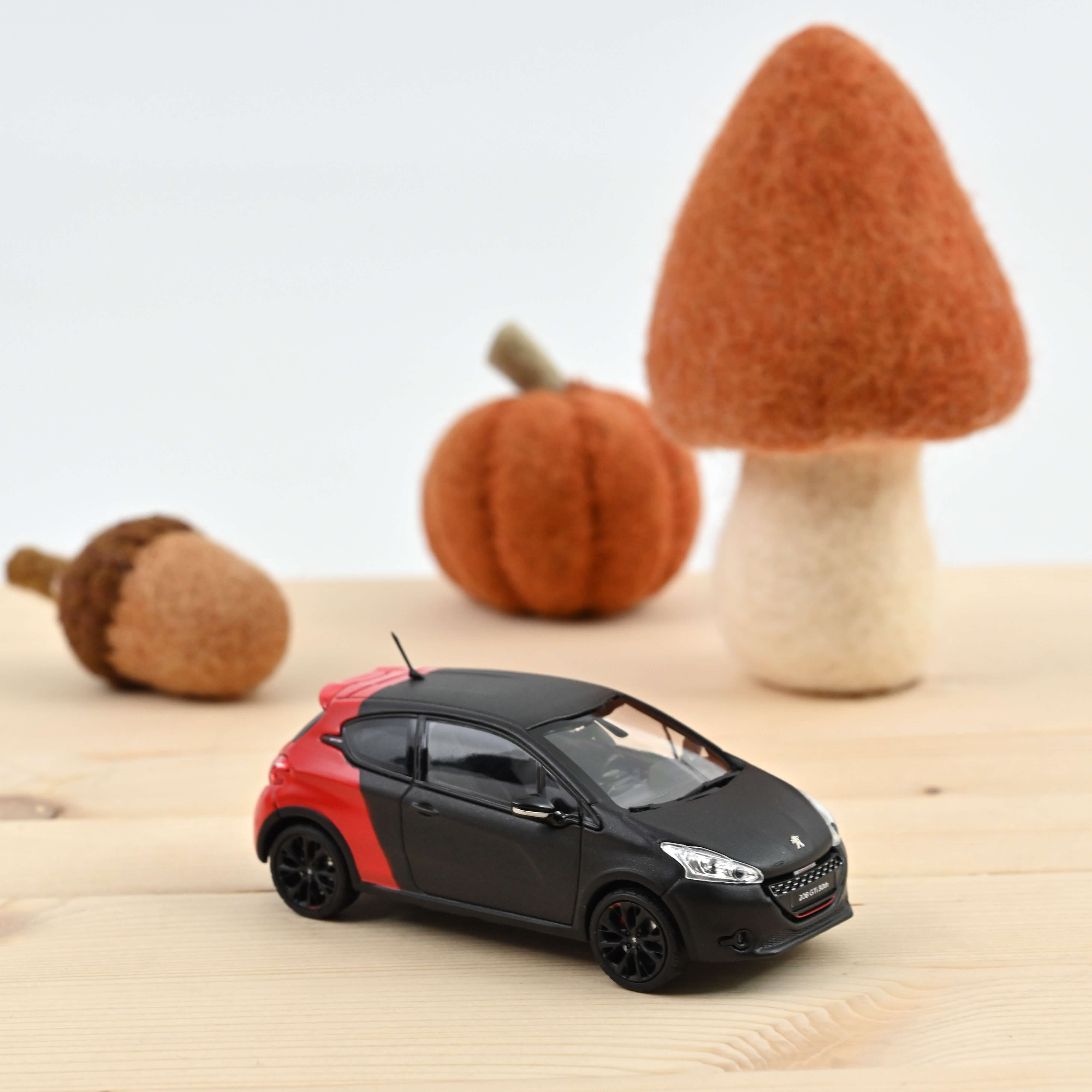 norev-peugeot-208-gti-30th-2014-modellino-auto-1-43-nero-opaco-e-rosso image 1