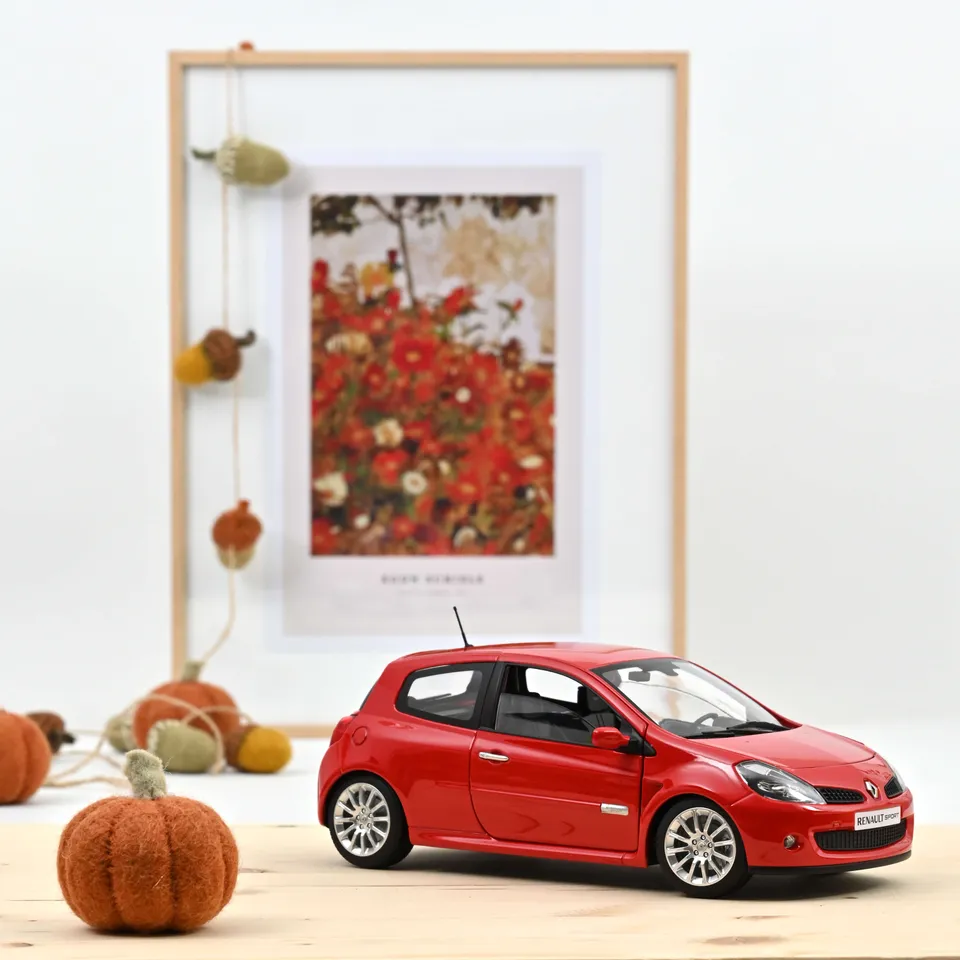 norev-renault-clio-r-s-2006-rosso-toro-1-18 image 1