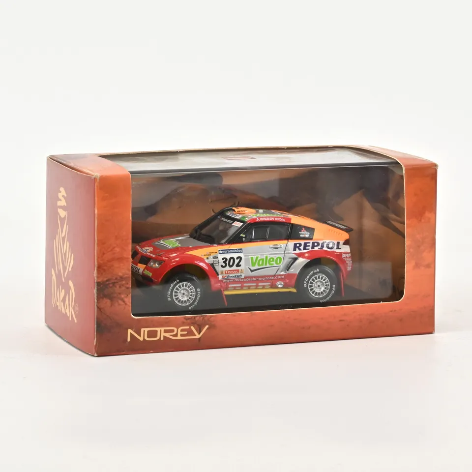 norev-mitsubishi-pajero-dakar-2006-1-43 image 1