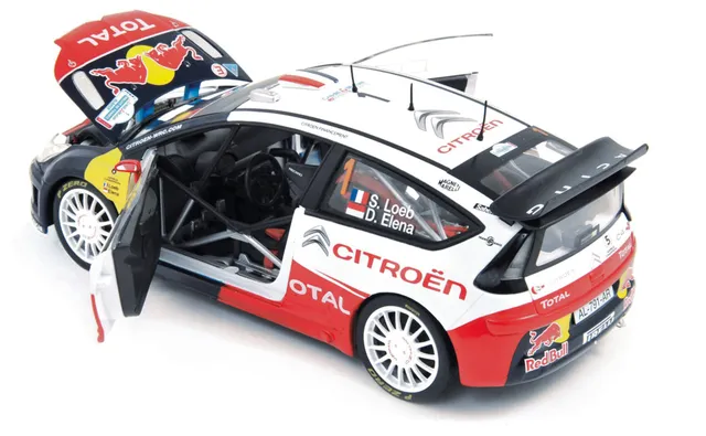 norev-citro-n-c4-wrc-2010-rally-francia-alsazia-modellino-1-18-loeb-elena-winner image 1