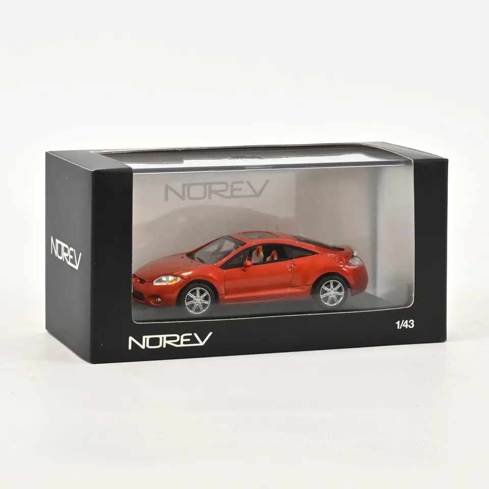 norev-mitsubishi-eclipse-coup-2006-orange-bizen-1-43-modellino-auto image 1