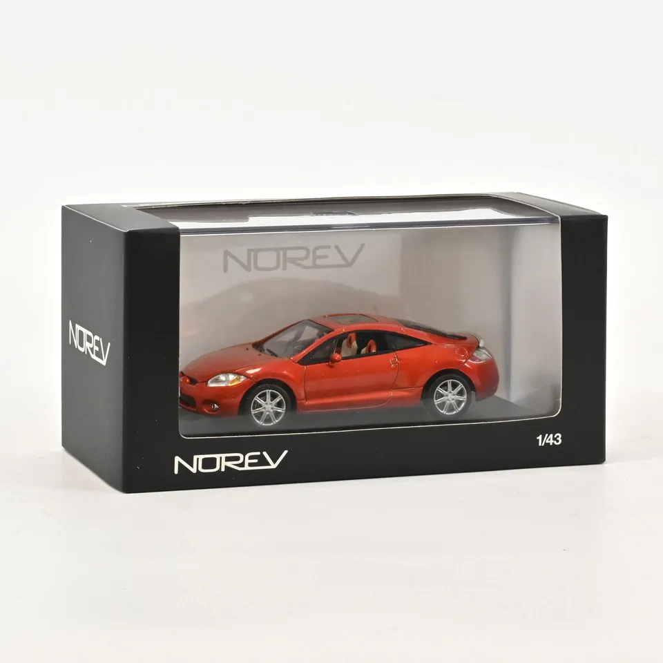 norev-mitsubishi-eclipse-coup-2006-modellino-1-43-bizen-orange image 1