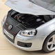 norev-vw-golf-gti-pirelli-2007-argento-1-18-modellino-auto-die-cast image 3
