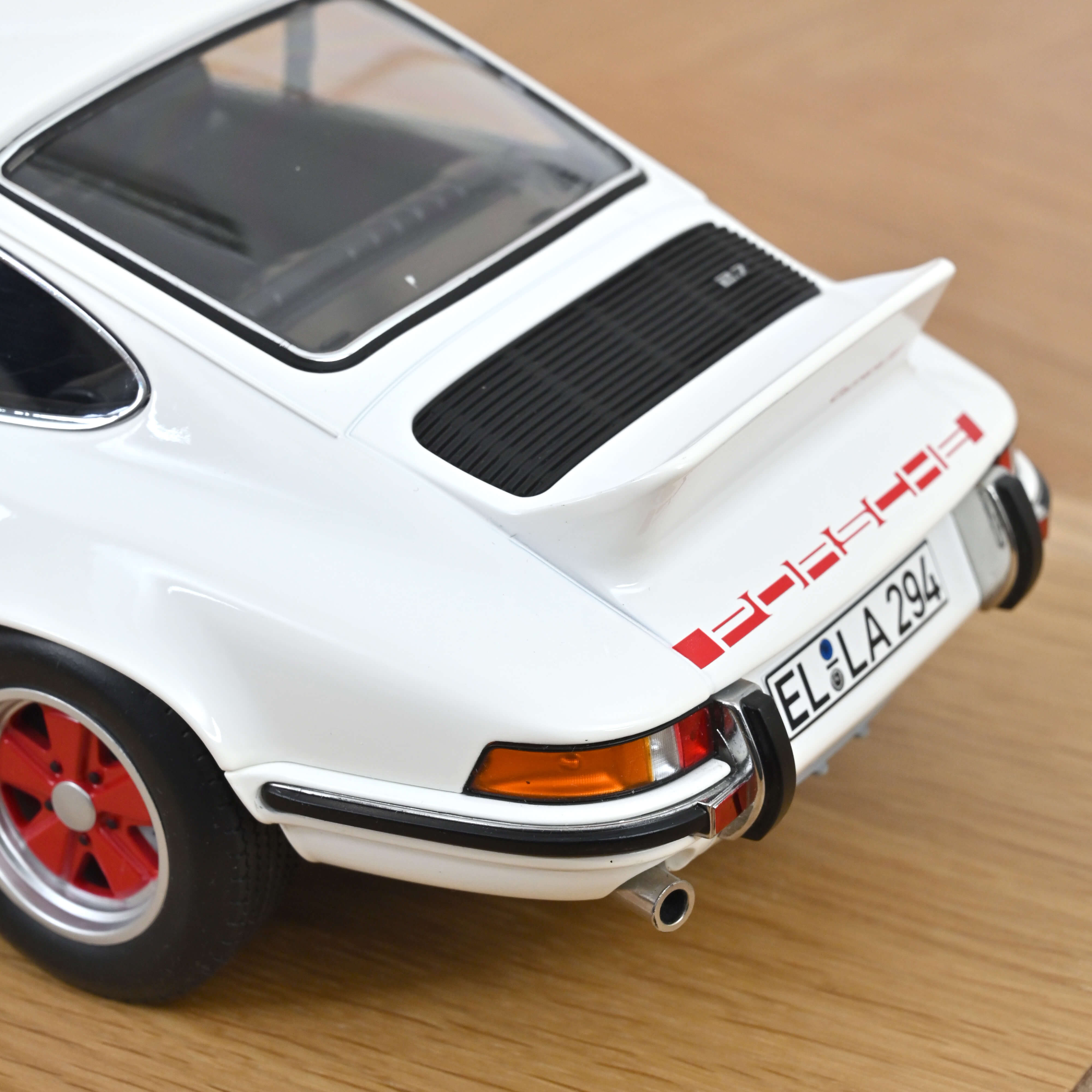 norev-porsche-911-carrera-rs-2-7-1973-grand-prix-blanc-et-rouge-1-12-modellino-d image 5