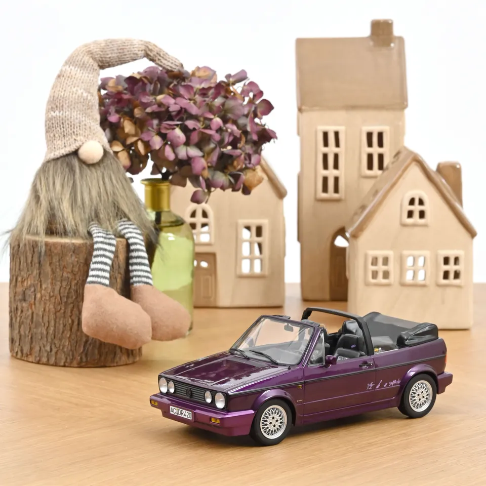 norev-vw-golf-cabriolet-genesis-1992-modellino-auto-1-18-viola-metallizzato-500- image 1