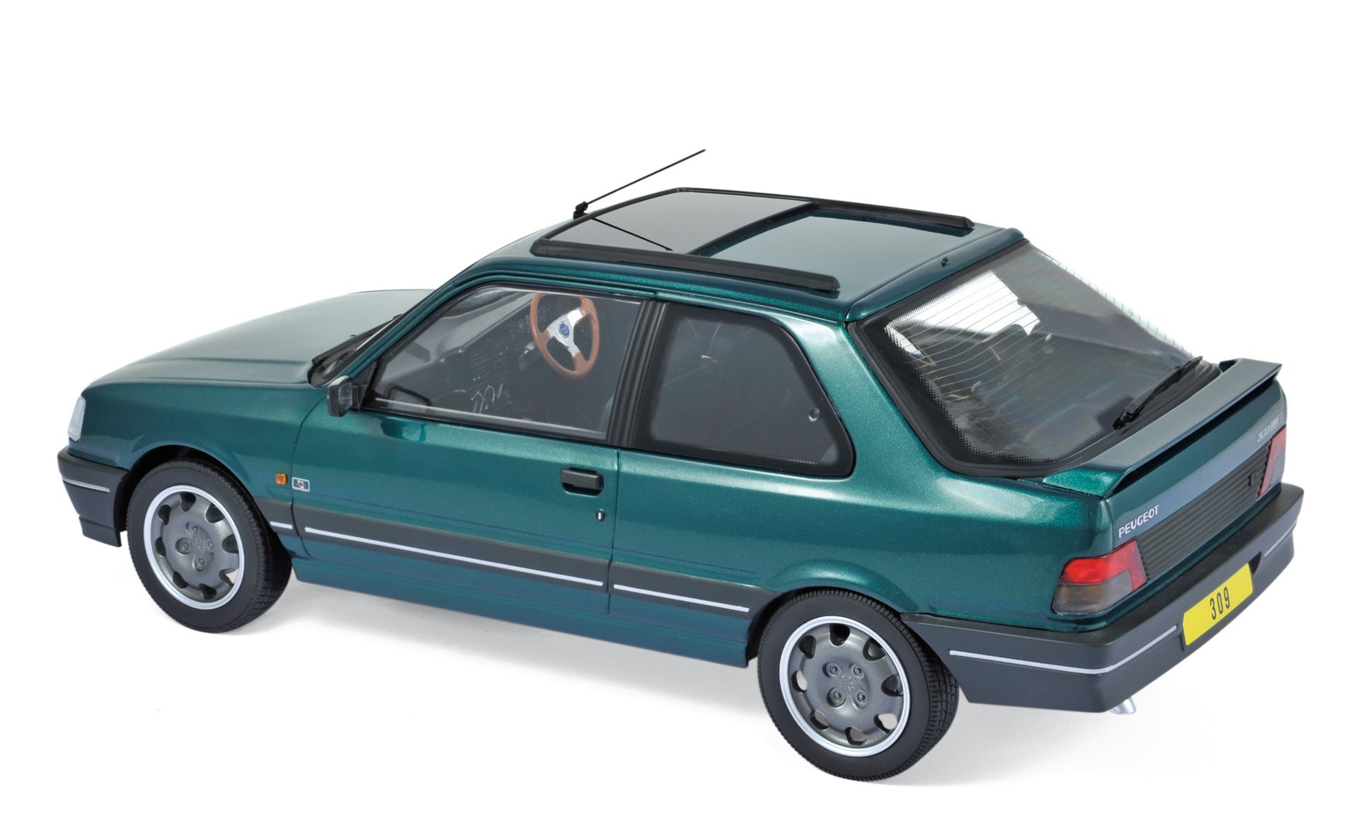 norev-peugeot-309-gti-1991-goodwood-green-modellino-auto-1-18 image 1