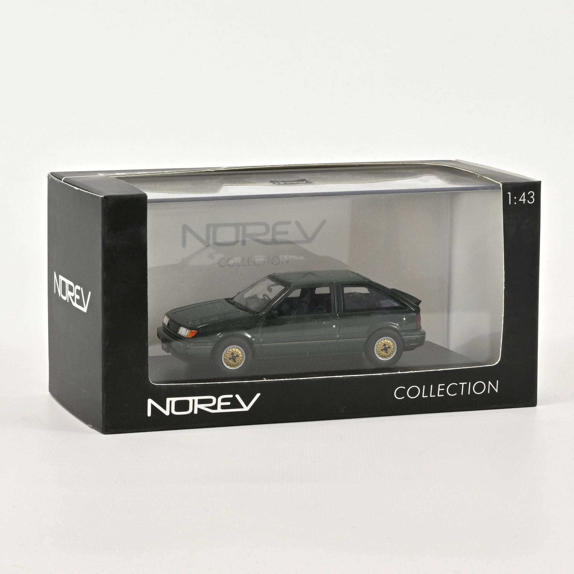 norev-isuzu-gemini-zz-1600-dohc-handling-by-lotus-1988-modellino-auto-1-43-verde image 1
