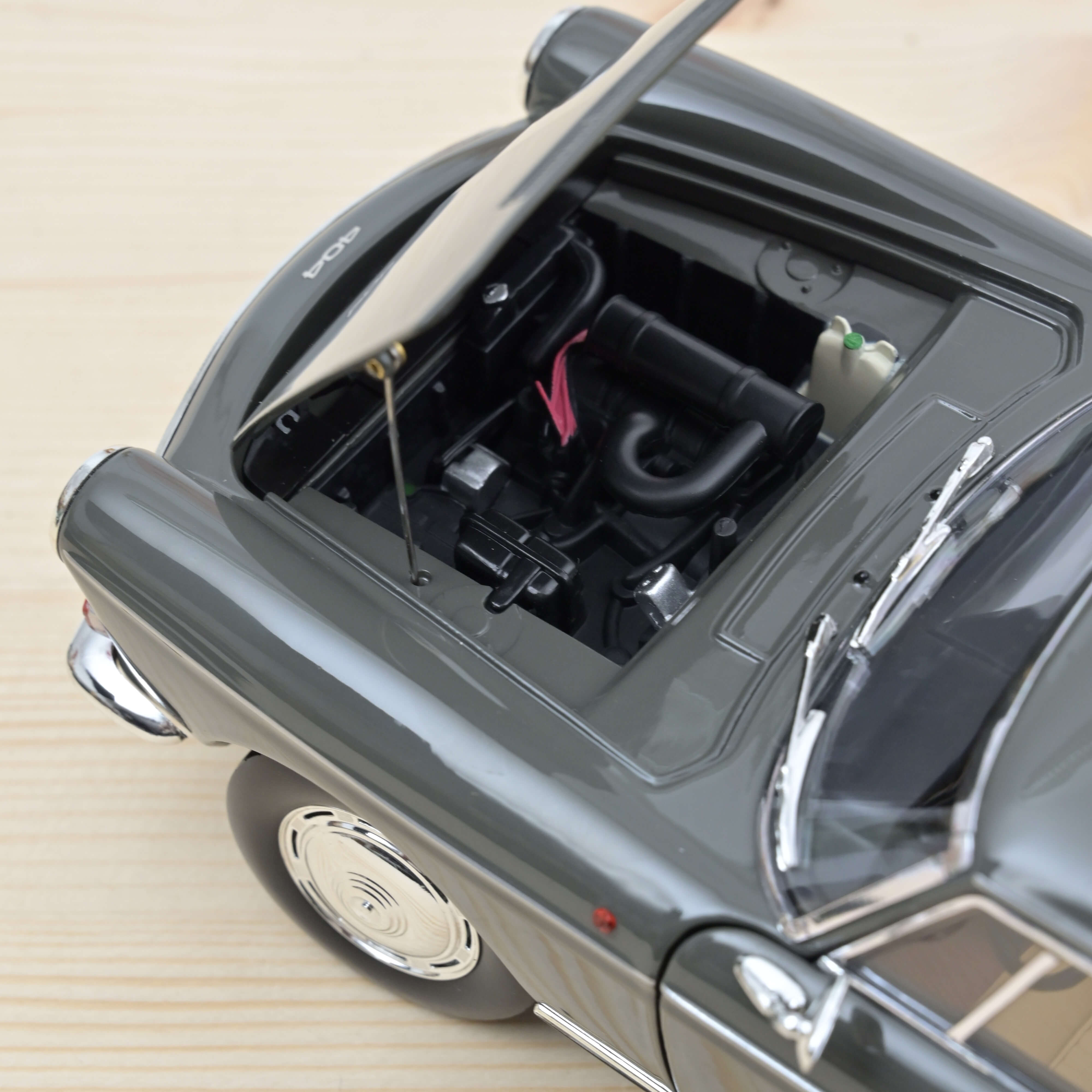 norev-peugeot-404-coup-1967-modellino-auto-1-18-grigio-grafite image 3