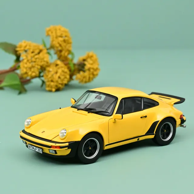 norev-porsche-911-turbo-3-0-1976-gialla-modellino-auto-1-18 image 1