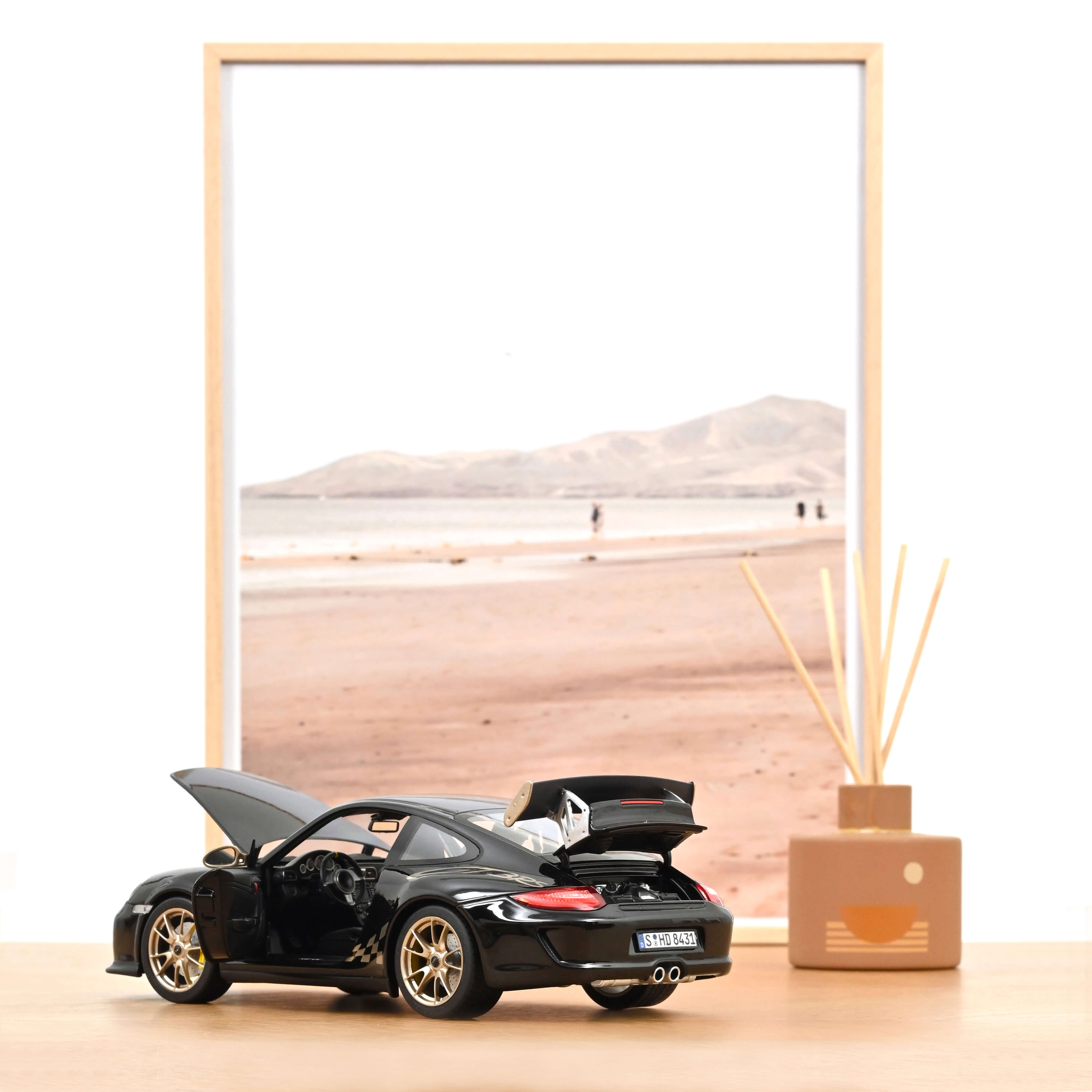 norev-porsche-911-gt3-rs-997-2009-nero-oro-metallizzato-modellino-1-18 image 2