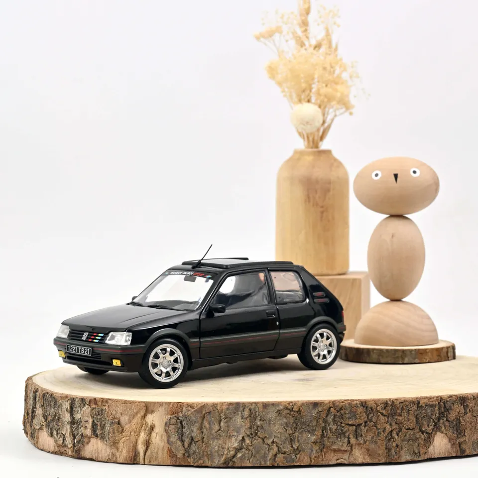 norev-peugeot-205-gti-1-9-1990-modellino-auto-1-18-nero-pts-205-pz image 1