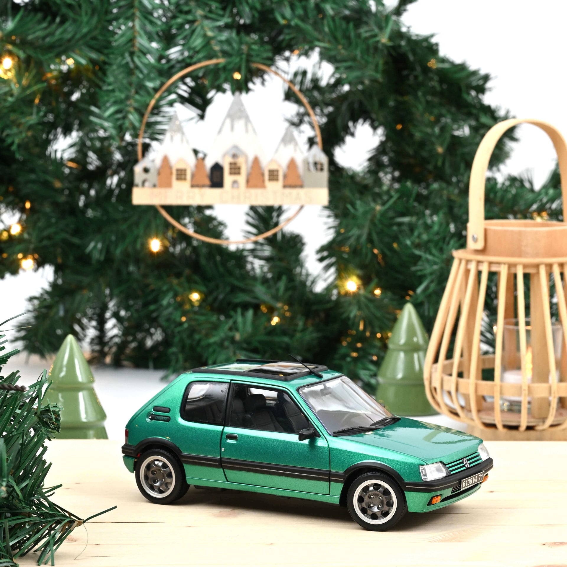 norev-peugeot-205-gti-griffe-1991-con-tetto-apribile-modellino-auto-1-18-verde image 1