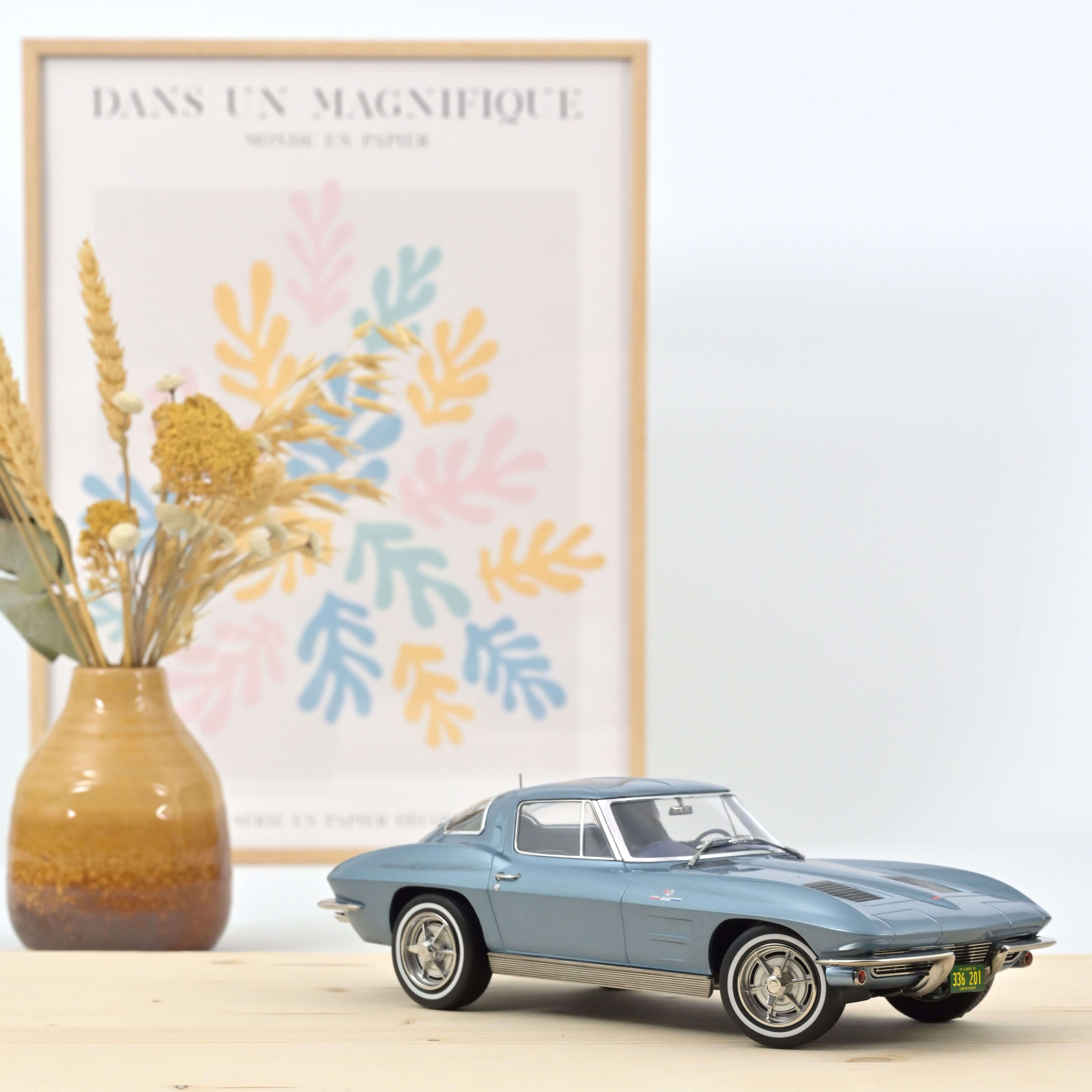 norev-chevrolet-corvette-sting-ray-1963-blu-chiaro-metallizzato-modellino-1-18 image 1