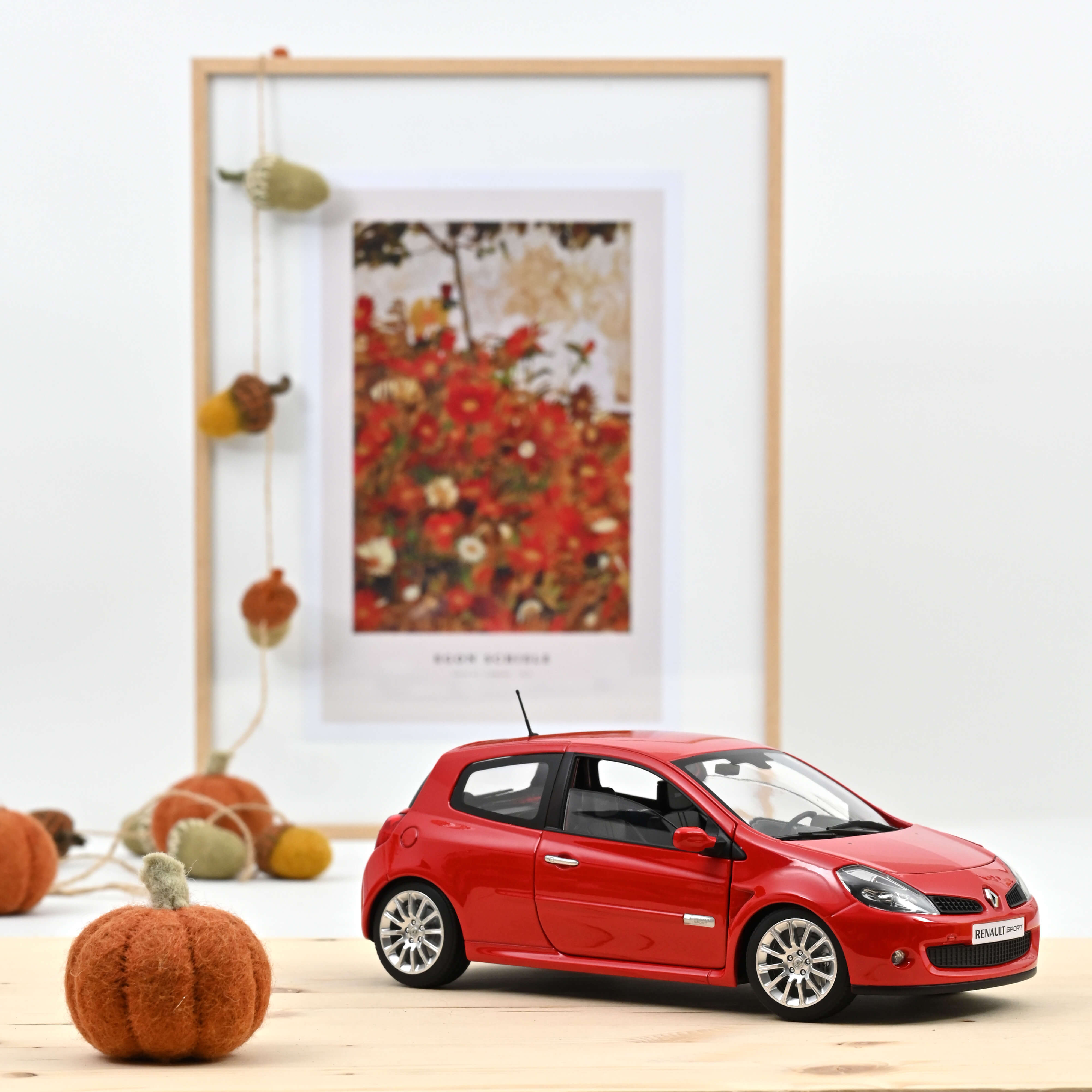 norev-renault-clio-r-s-2006-rosso-toro-1-18 image 1