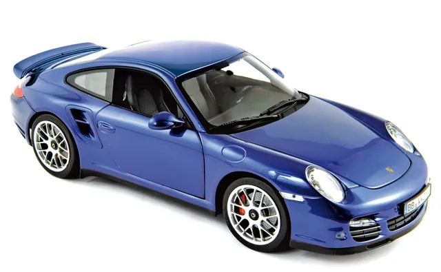 norev-porsche-911-turbo-2010-blu-aqua-1-18-modellino-auto-die-cast image 1