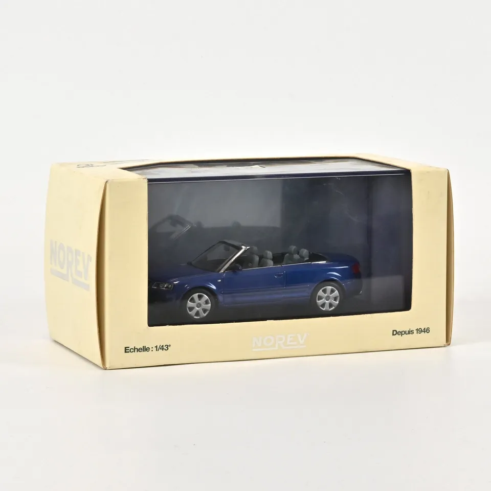 norev-audi-a4-cabriolet-modellino-auto-1-43-blu-caraibi image 1