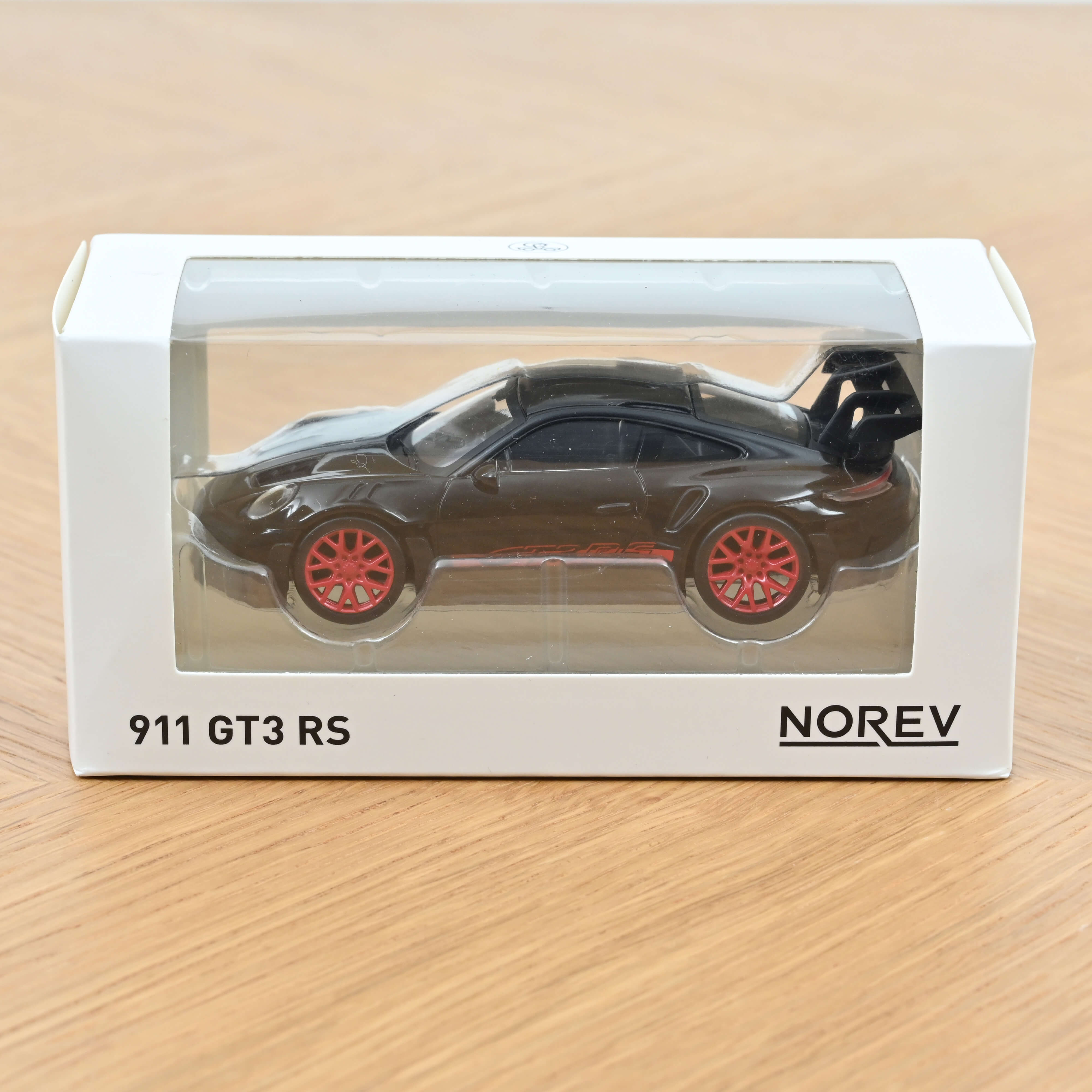 norev-porsche-911-gt3-rs-2022-nero-e-rosso-modellino-auto-1-43-jet-car image 2