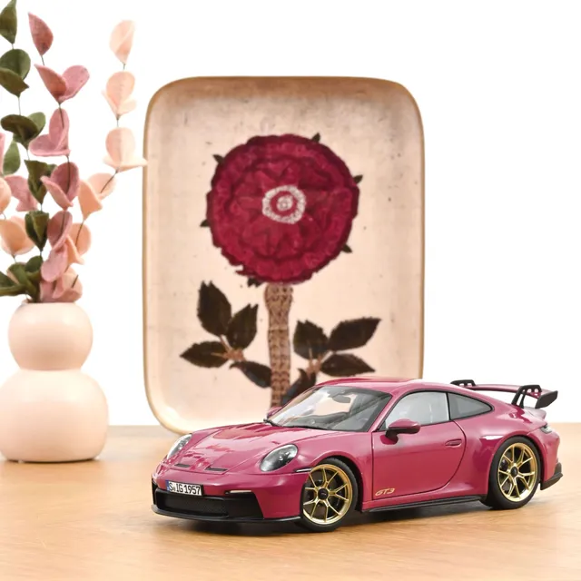 norev-porsche-911-gt3-2021-992-modellino-auto-1-18-ruby-star-neo image 1