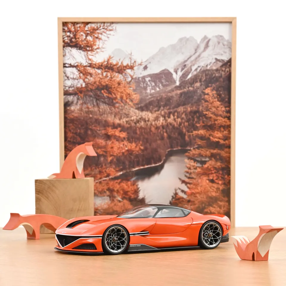 norev-genesis-x-gran-berlinetta-vgt-2024-orange-magma-1-18-vision-gran-turismo image 1