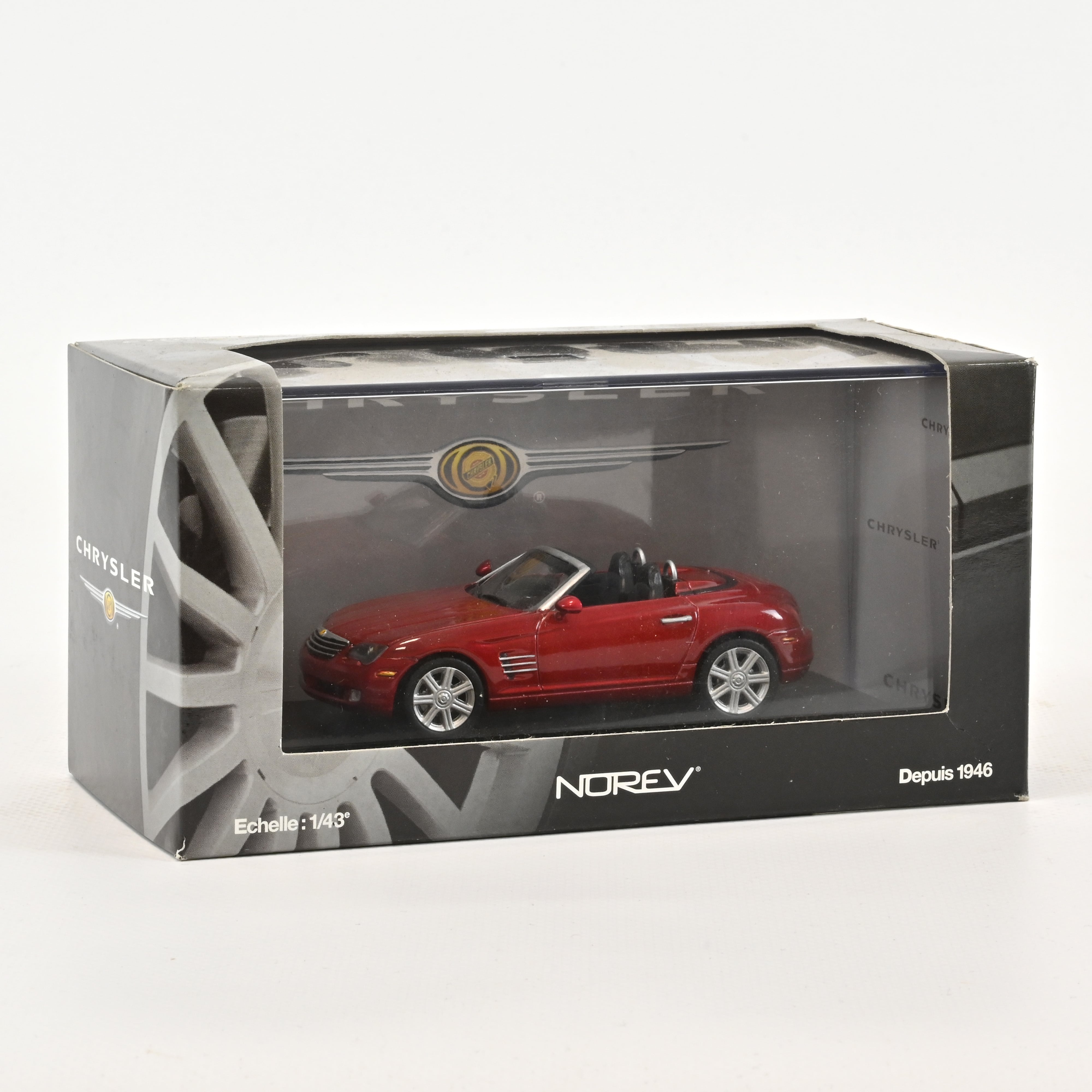 norev-chrysler-crossfire-roadster-rosso-cristal-scala-1-43-modellino-die-cast image 1