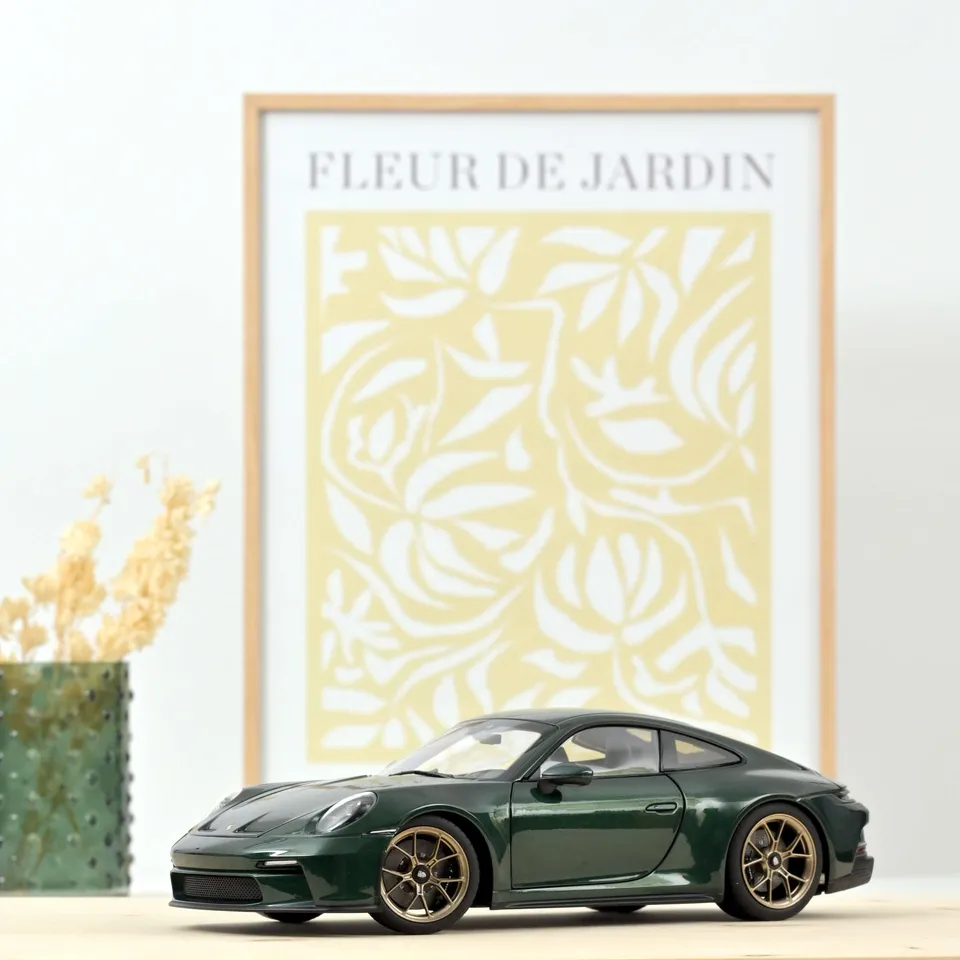 norev-porsche-911-gt3-touring-package-2021-green-met-1-18-300-pcs image 1